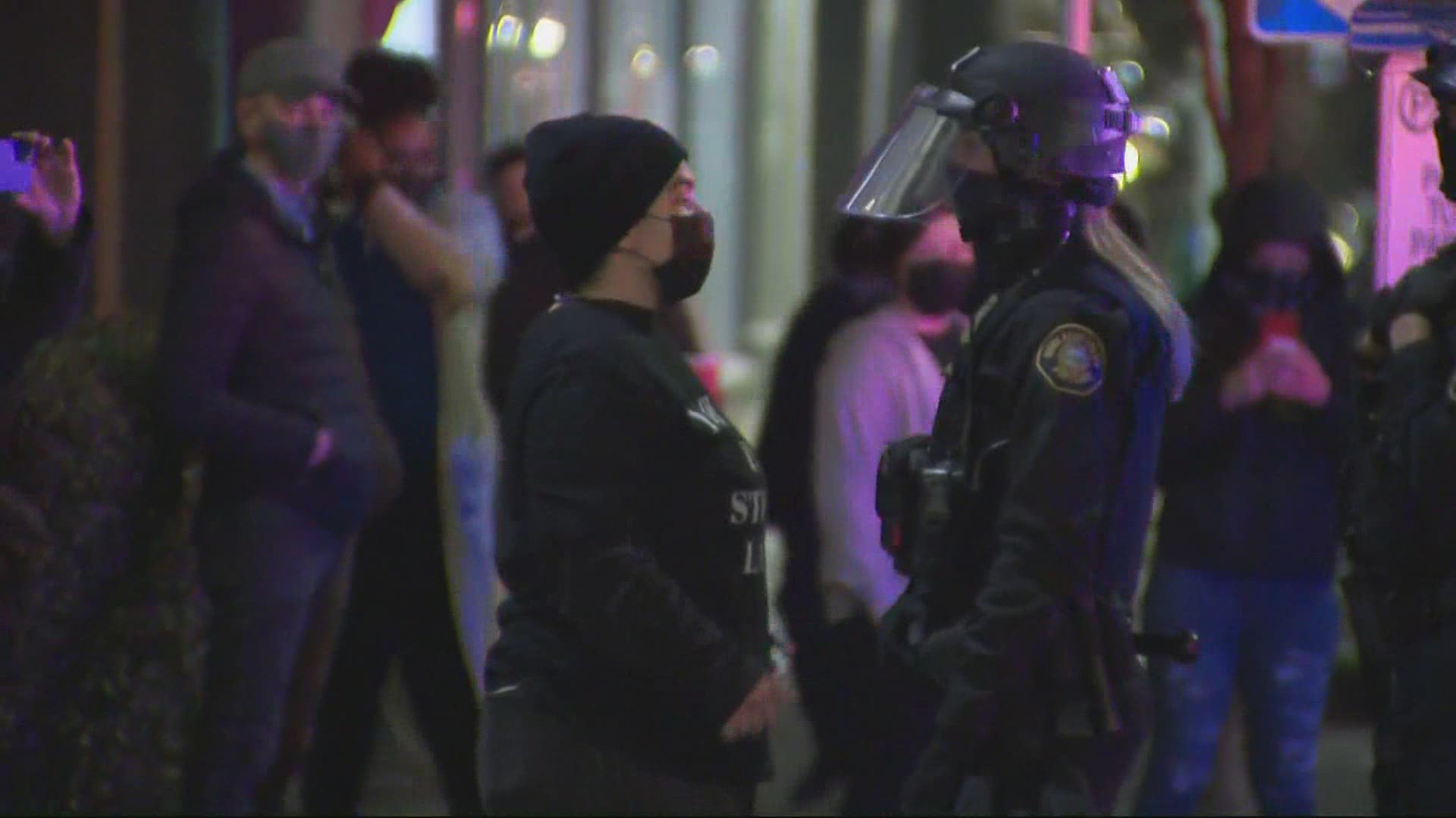 On the second consecutive night of Portland protests, police detain people in Pearl District, including credentialed media.