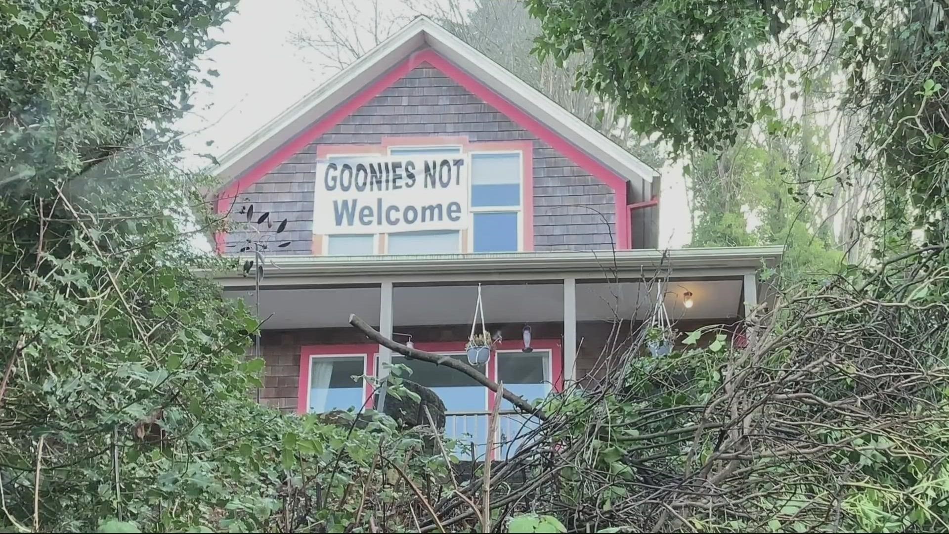 One neighbor of the house from the iconic 1985 movie, "The Goonies," hung a large banner on their house telling fans of the movie to stay away.