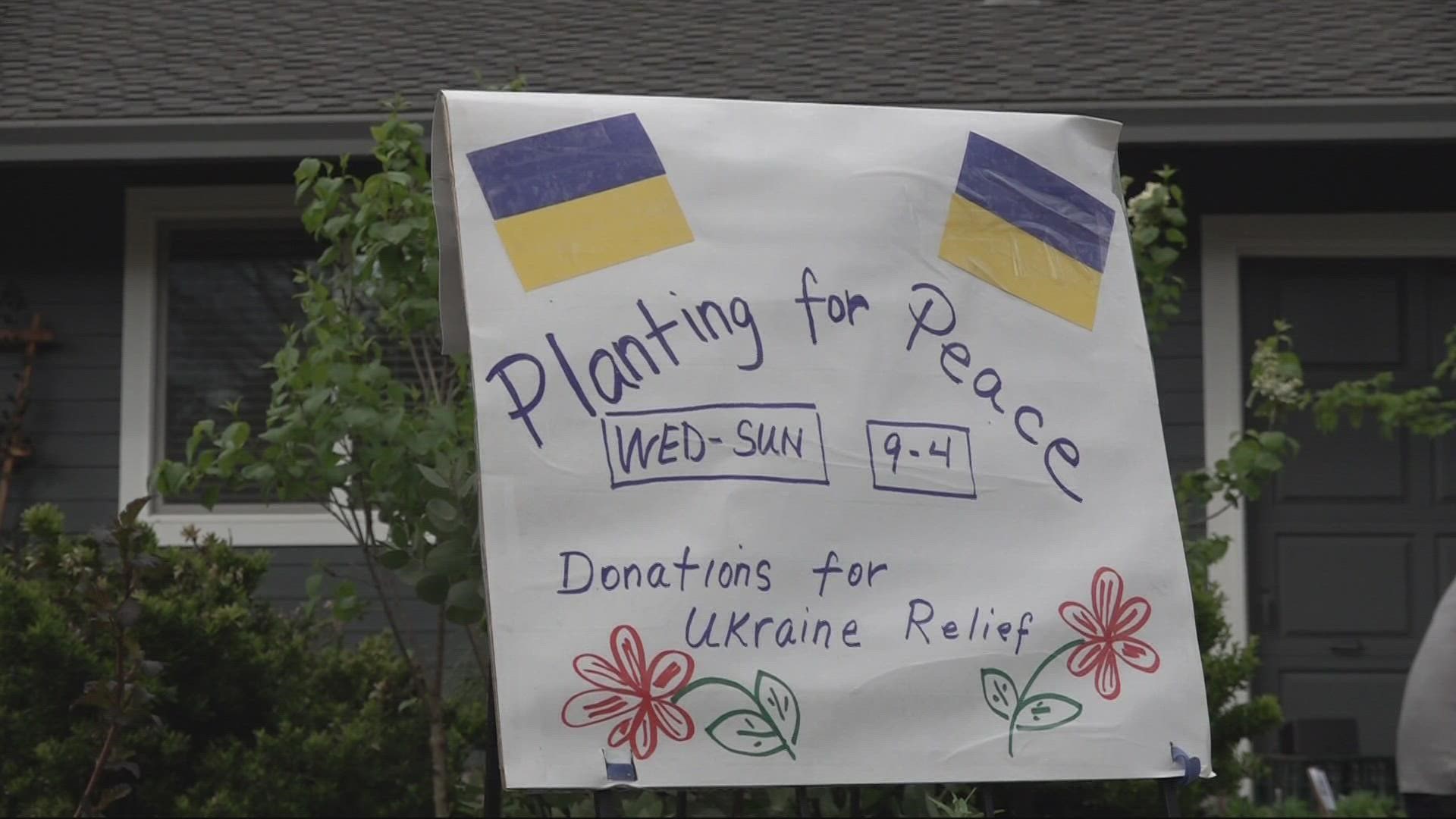 A neighborhood in Southwest Portland is selling plants to help a Ukrainian family living on the street. KGW's Bryant Clerkley spoke to those involved.