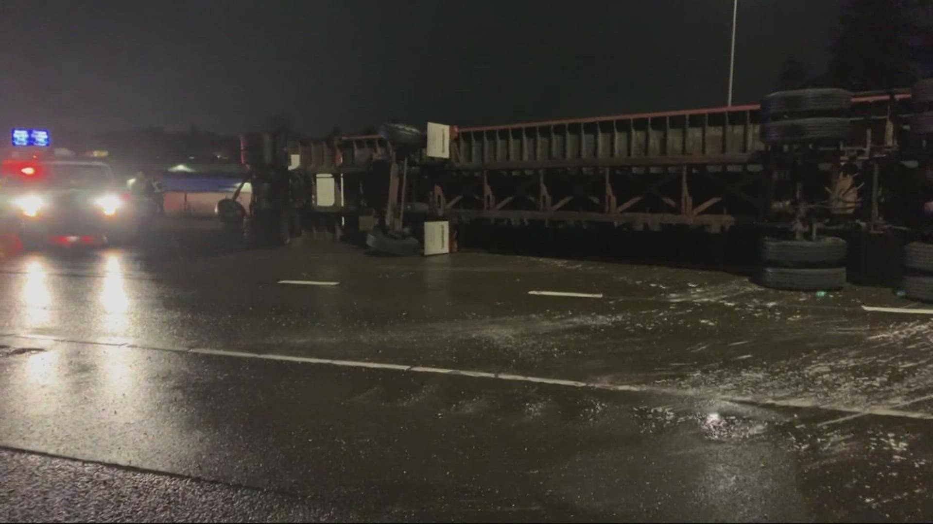 An overturned semi-truck blocked the northbound lanes of Interstate 5 at Boones Ferry Road on Dec. 27.