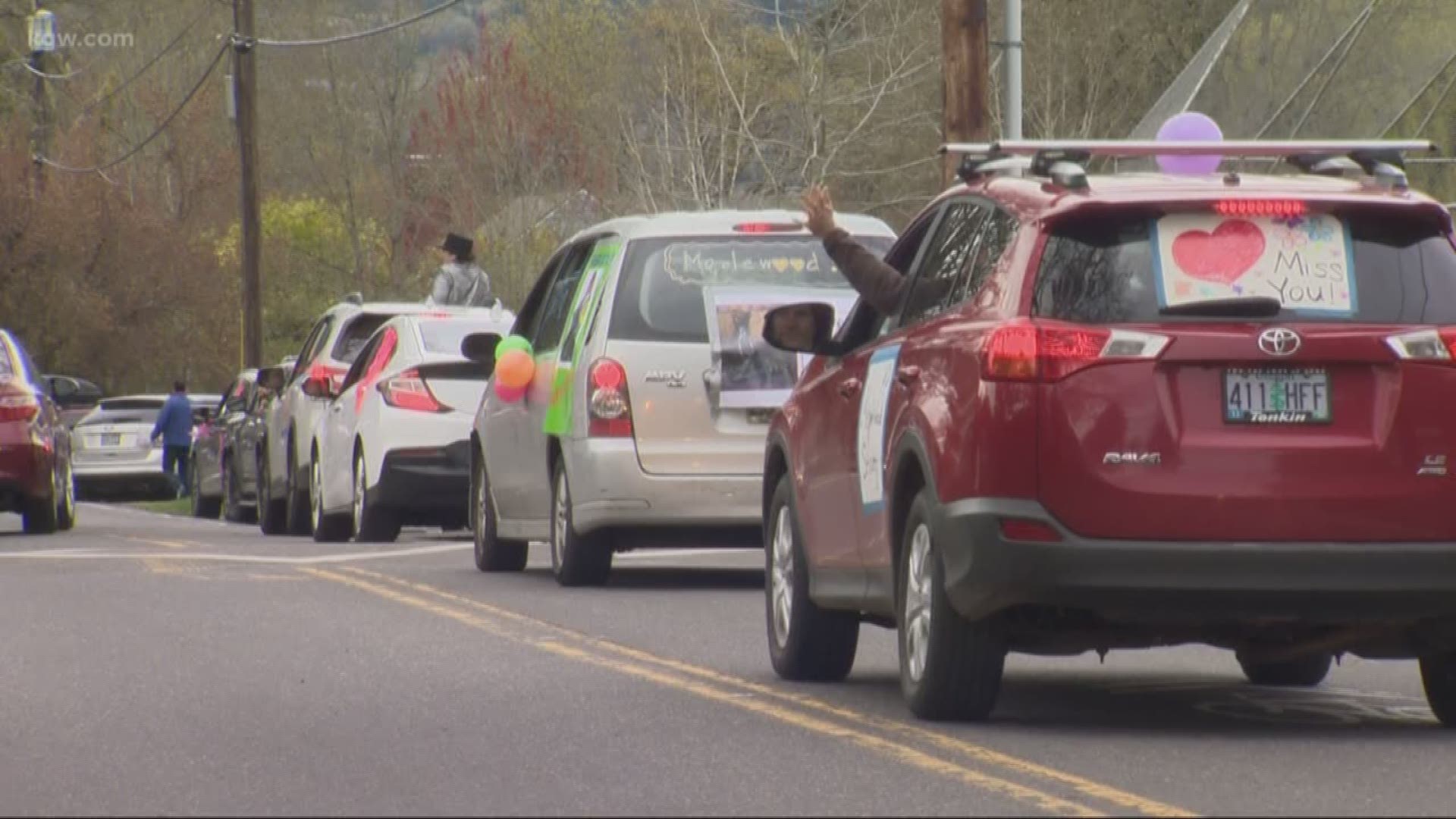 Teachers from Portland and Gresham waved hello from their cars as students lined the street at a safe social distance.