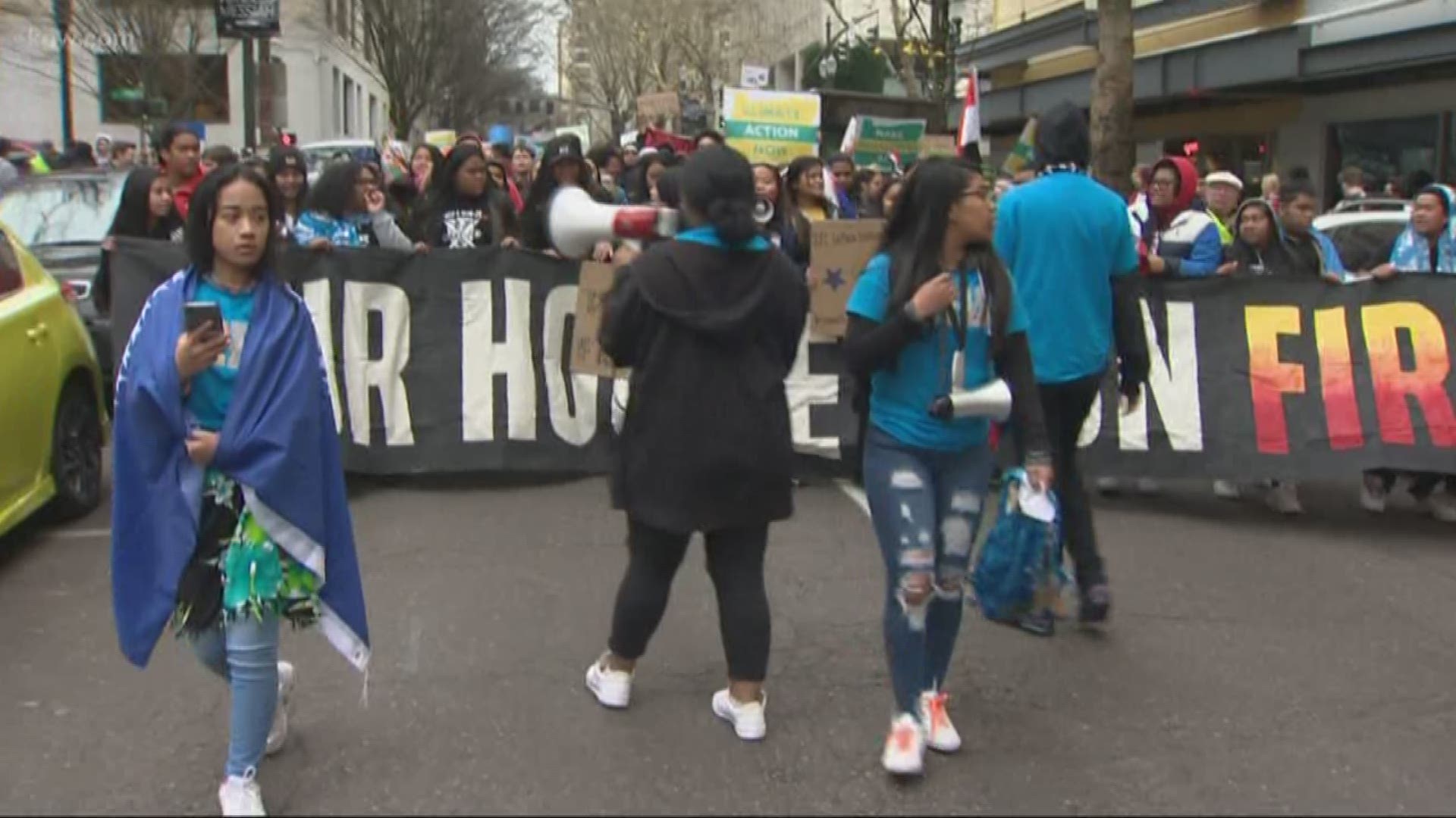 Hundreds of students and supporters marched through the streets of downtown Portland calling for climate justice.
