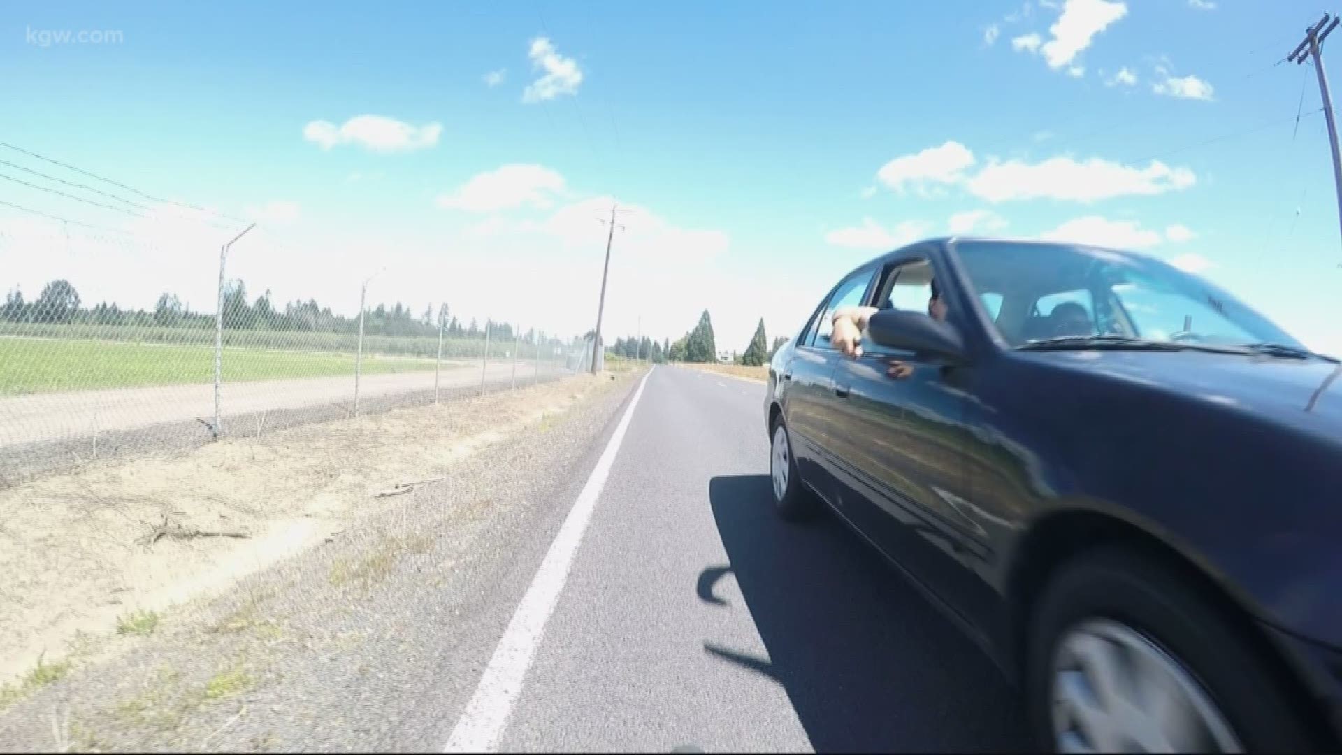 A Hillsboro bicyclist says he was nearly stabbed by a passenger in a passing car while on a ride in rural Washington County on Saturday afternoon.