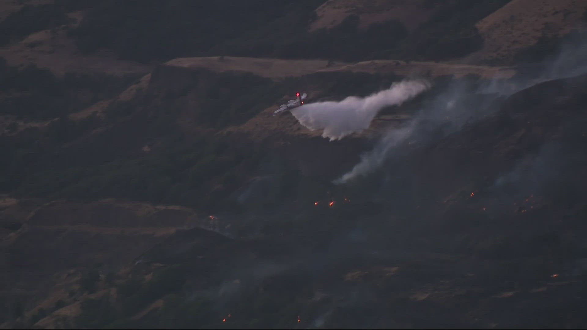 The Burdoin Fire has closed miles of State Route 14, with planes and choppers fighting the blaze that's spreading from heavy wind. 