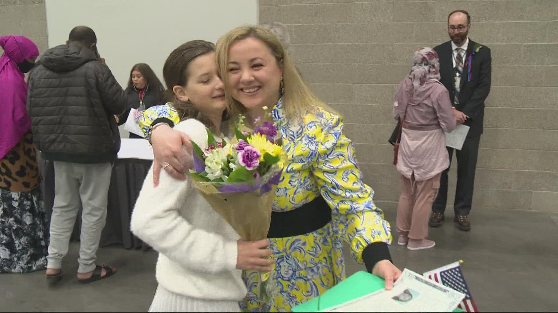 Evghenia Sincariuc, who moved to America from Ukraine in 2016, described citizenship as an amazing dream as she celebrated with her family.