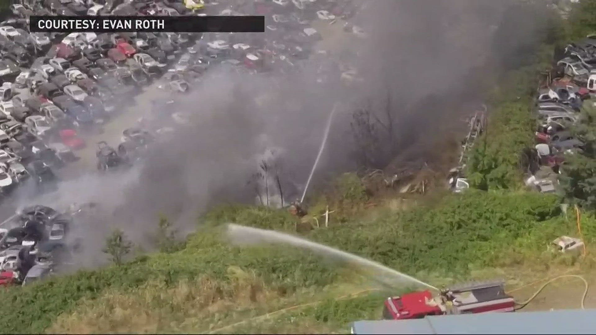 Flames, plumes of smoke from fire at Salem auto wrecking yard near I5