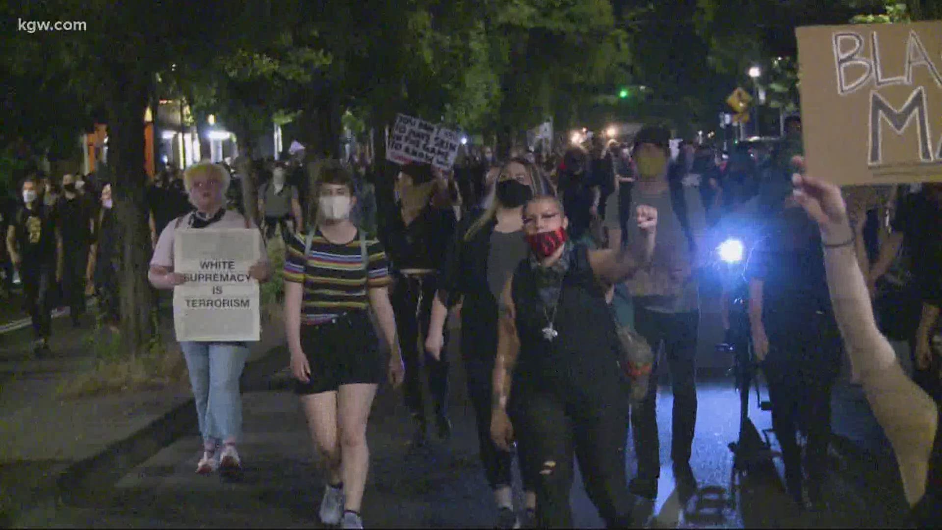 Police say the crowd refused to leave the area when told and that some members of the group threw items towards officers stationed on the roof of the North Precinct.