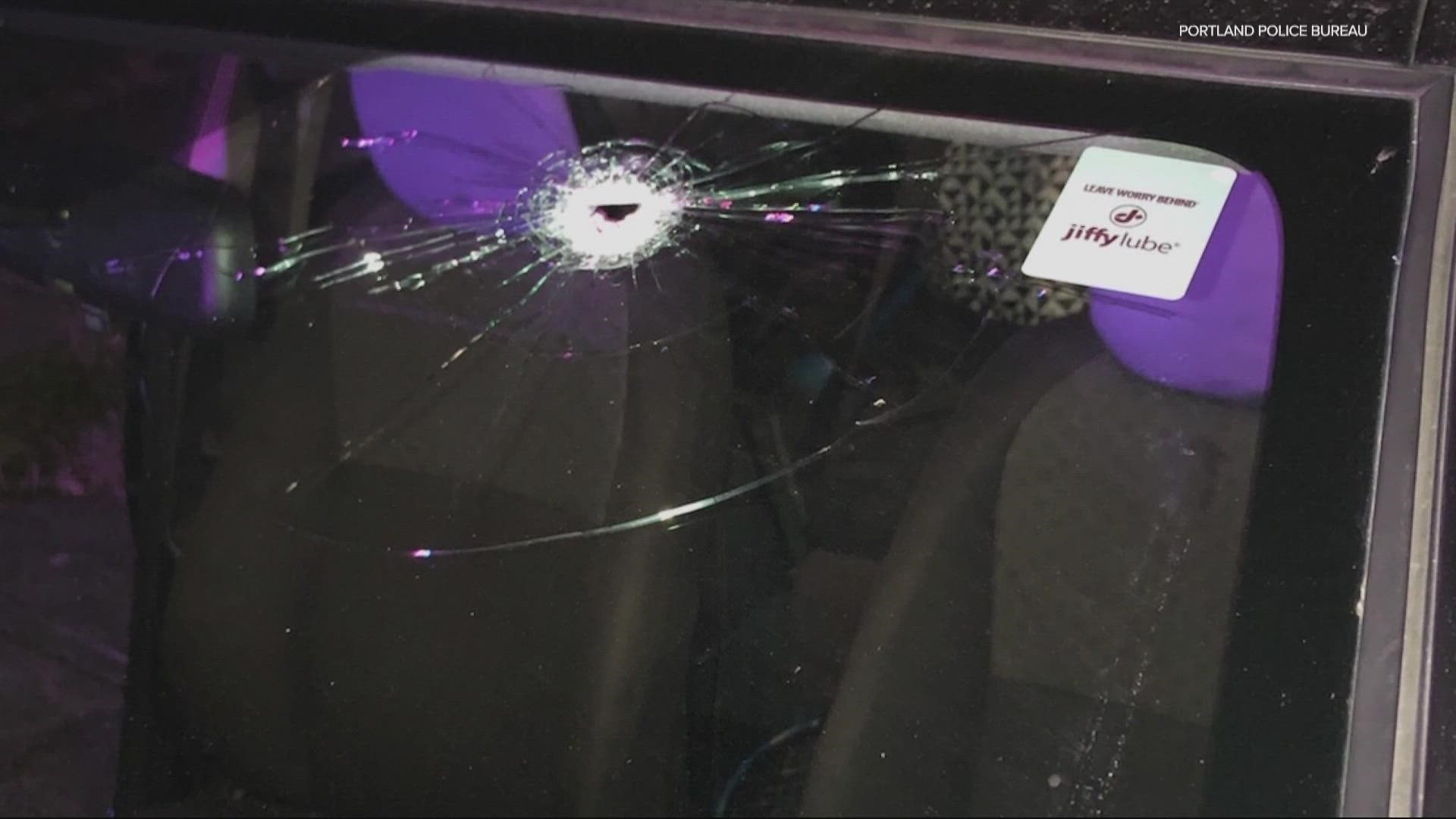 Two bullets hit the woman's car as well as a Portland Parks & Recreation truck. No one was hurt.