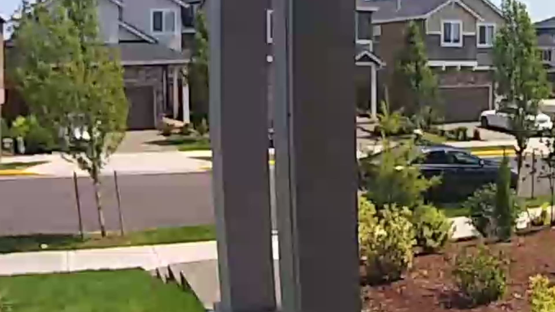 A woman dressed as an FedEx employee steals packages from a home in Happy Valley, Ore.