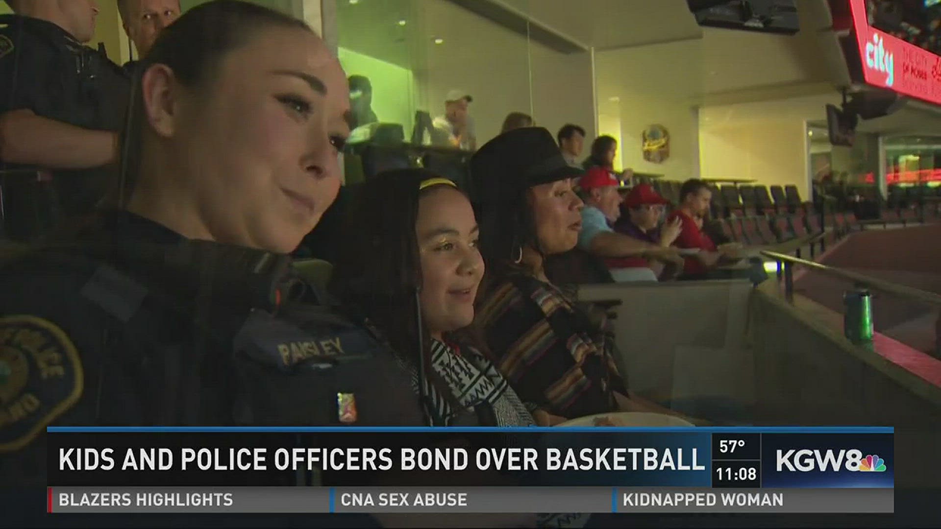 Kids and police officers bond over basketball