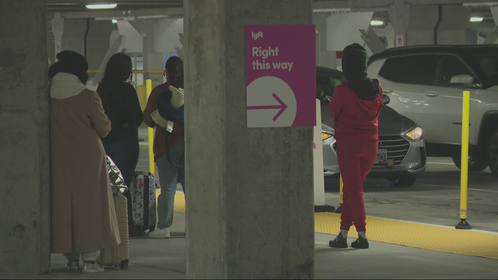 Passengers entering PDX can go through an underground tunnel to reach their taxis, Ubers and Lyfts inside the short-term parking garage’s first level.