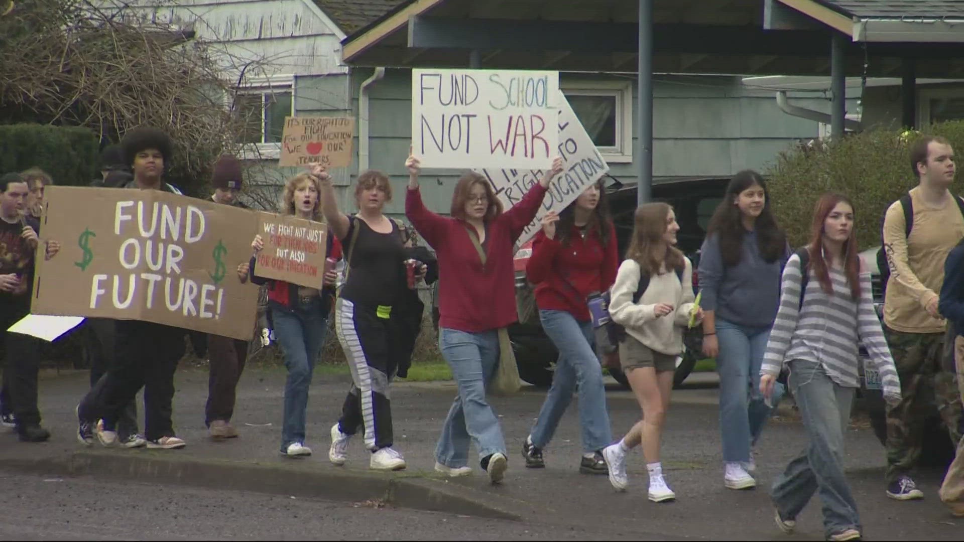 After Vancouver Public Schools approved a plan to cut $35 million and hundreds of jobs, students walked out in protest Thursday.