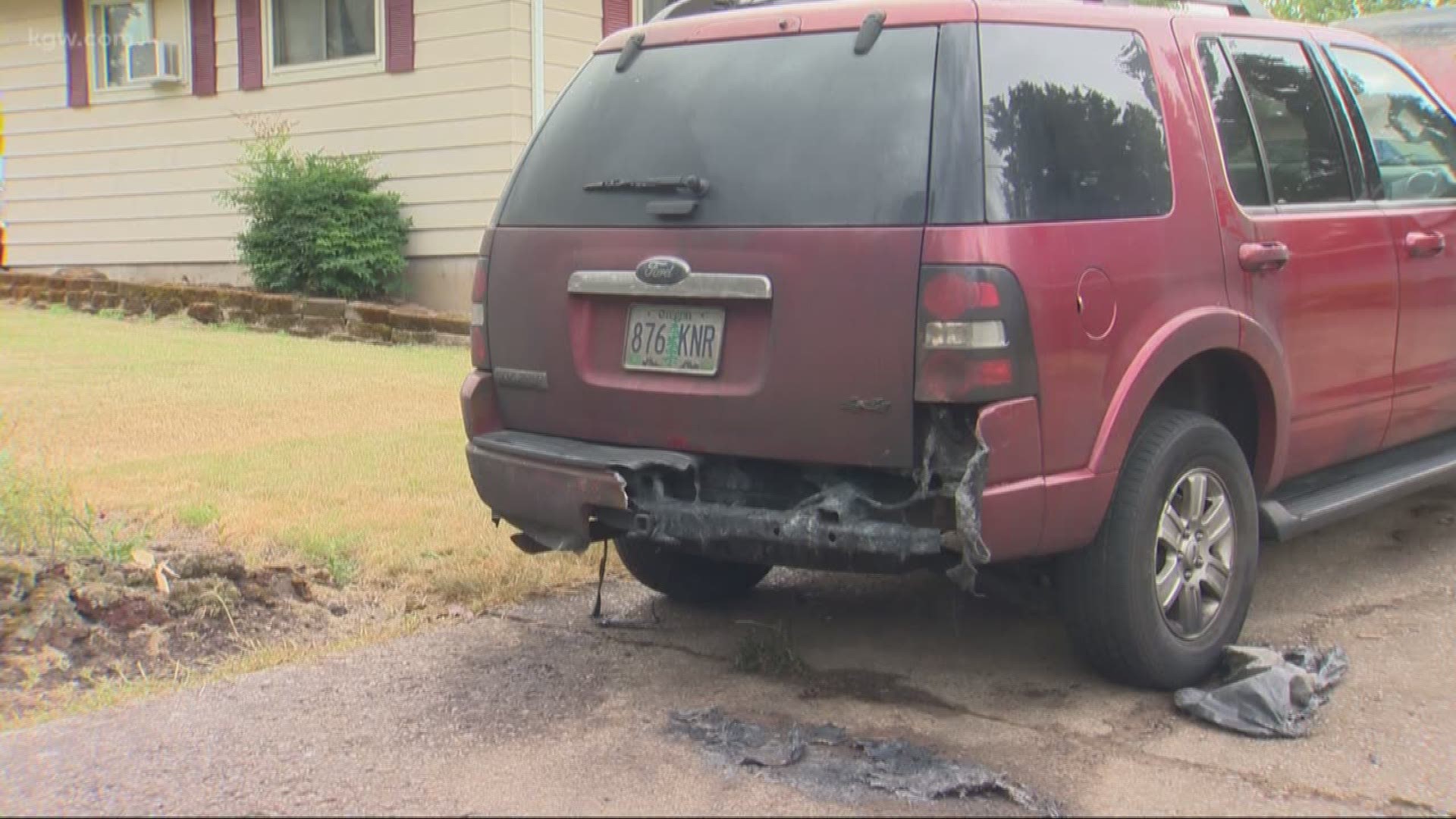 Police say a man’s SUV was set on fire hours after he got into a confrontation with several people who objected to his removal of items from a Salem roadside memorial honoring three teens.