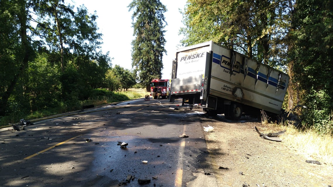 Truck bursts into flames after crash near Aurora; two injured