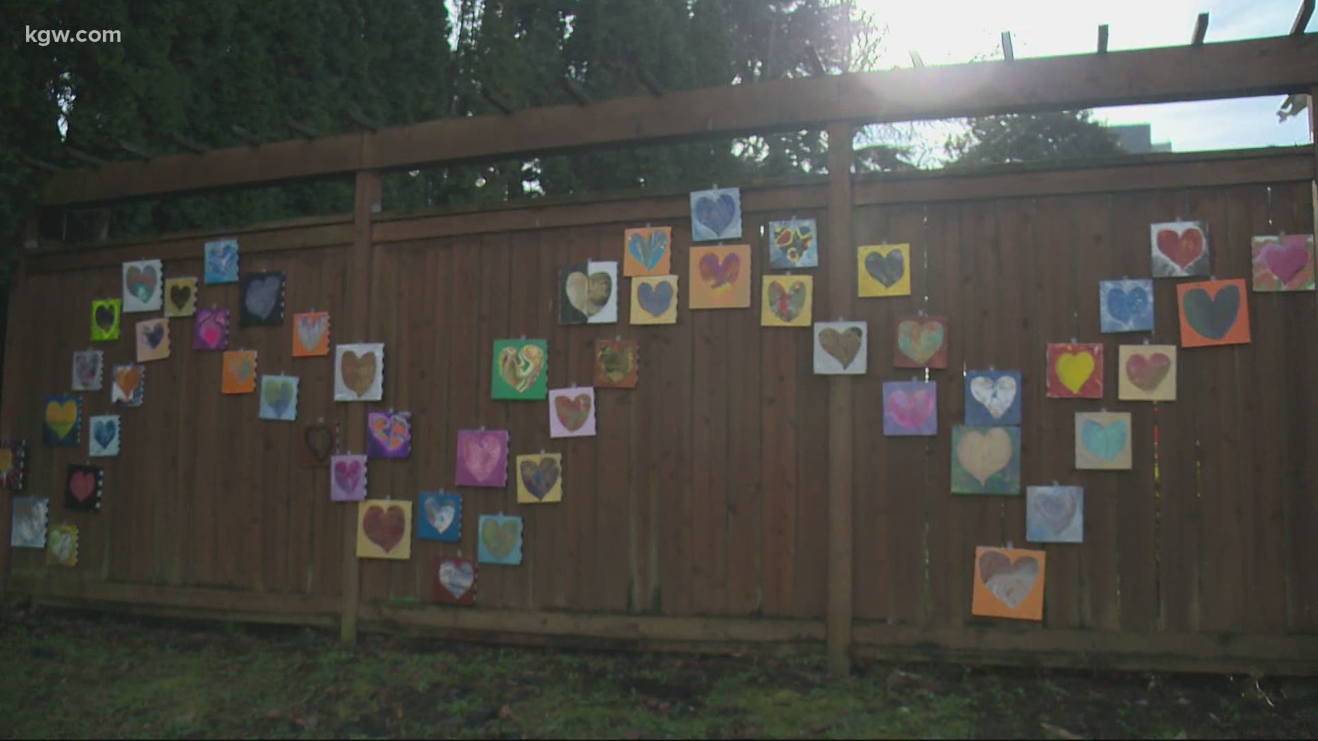 For every life lost, a Portland artist has painted a heart in their memory and hung it on her front porch.