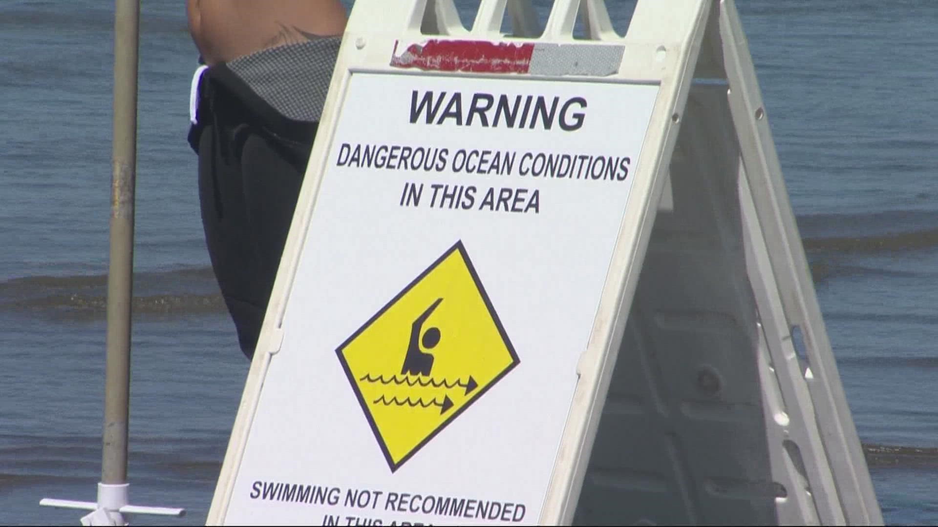 Multiple rip tides and other hazards put many swimmers in harm’s way. One man in his 50s died after being rescued.