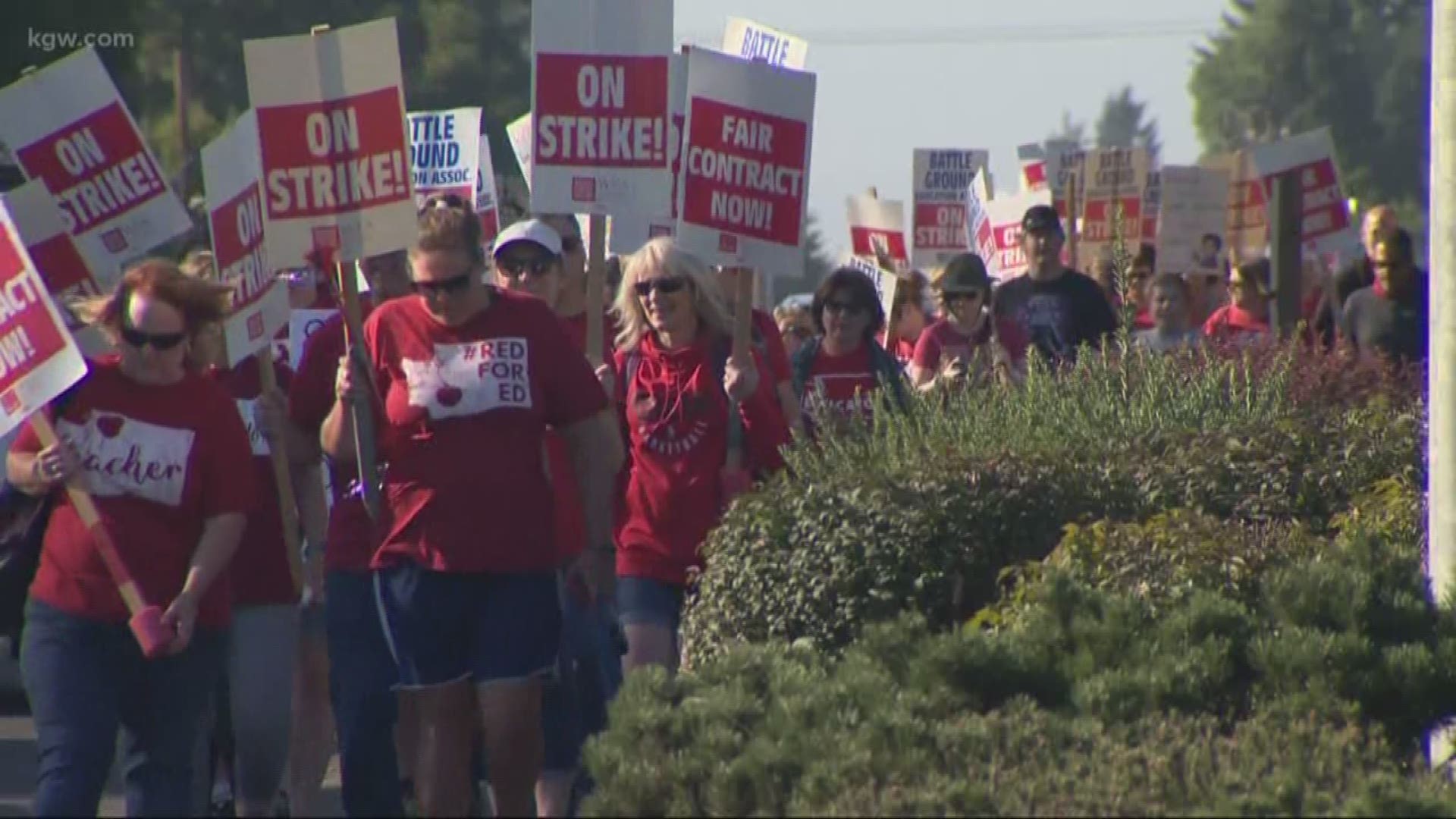Striking Battle Ground school teachers marched through town to draw attention to a contract impasse.
