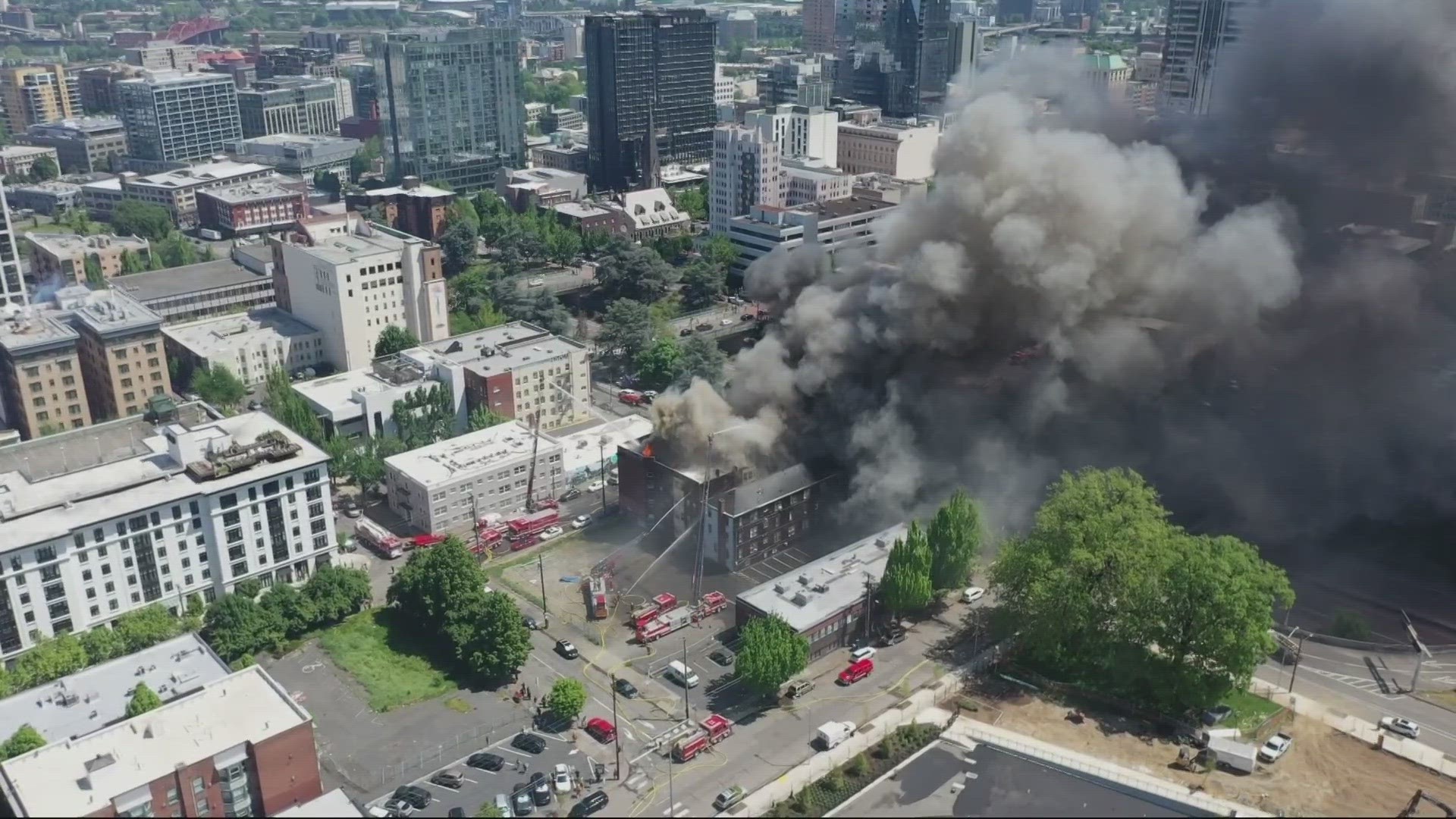 The 5-story building at Southwest 14th and Taylor was heavily engulfed in smoke on the morning of May 16, and the fire continued to burn into the afternoon.