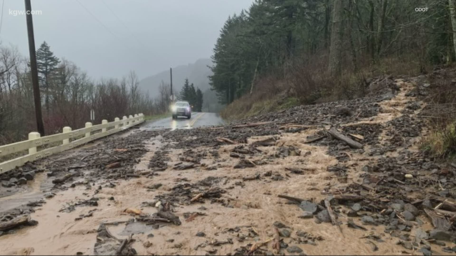 Flooding and landslides after this weekend's heavy rains closed roads in several counties and wiped out a footbridge over Johnson Creek.