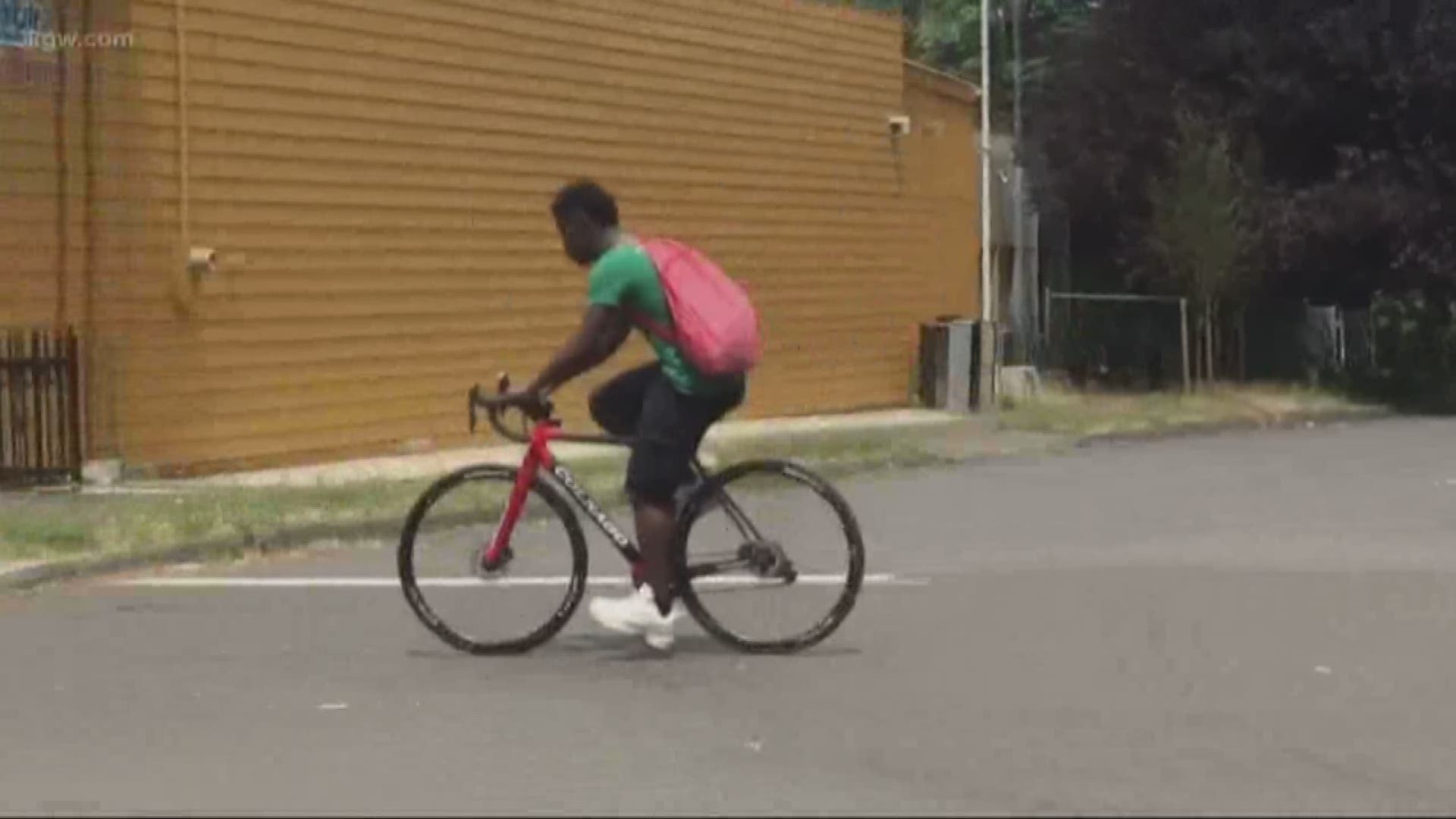 A bike rider was attacked in Gresham and thieves stole his road bike.