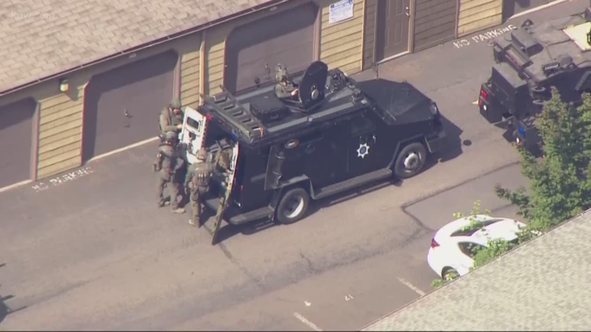 An hours-long standoff is over after a man surrendered to police in Milwaukie Friday night.