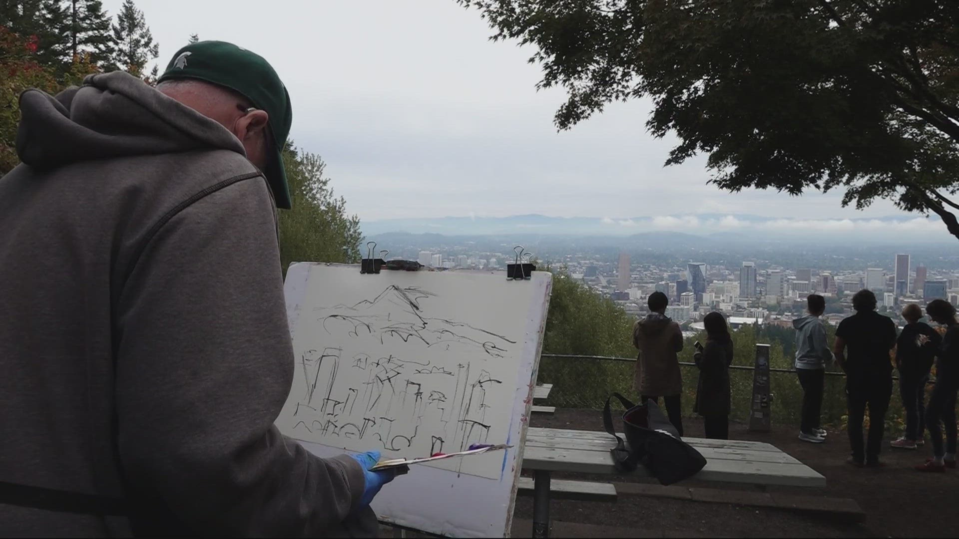 People from the Oregon Society of Artists were outside Pittock Mansion Saturday. Organizers encouraged people to stop by and learn about the mansion's history.