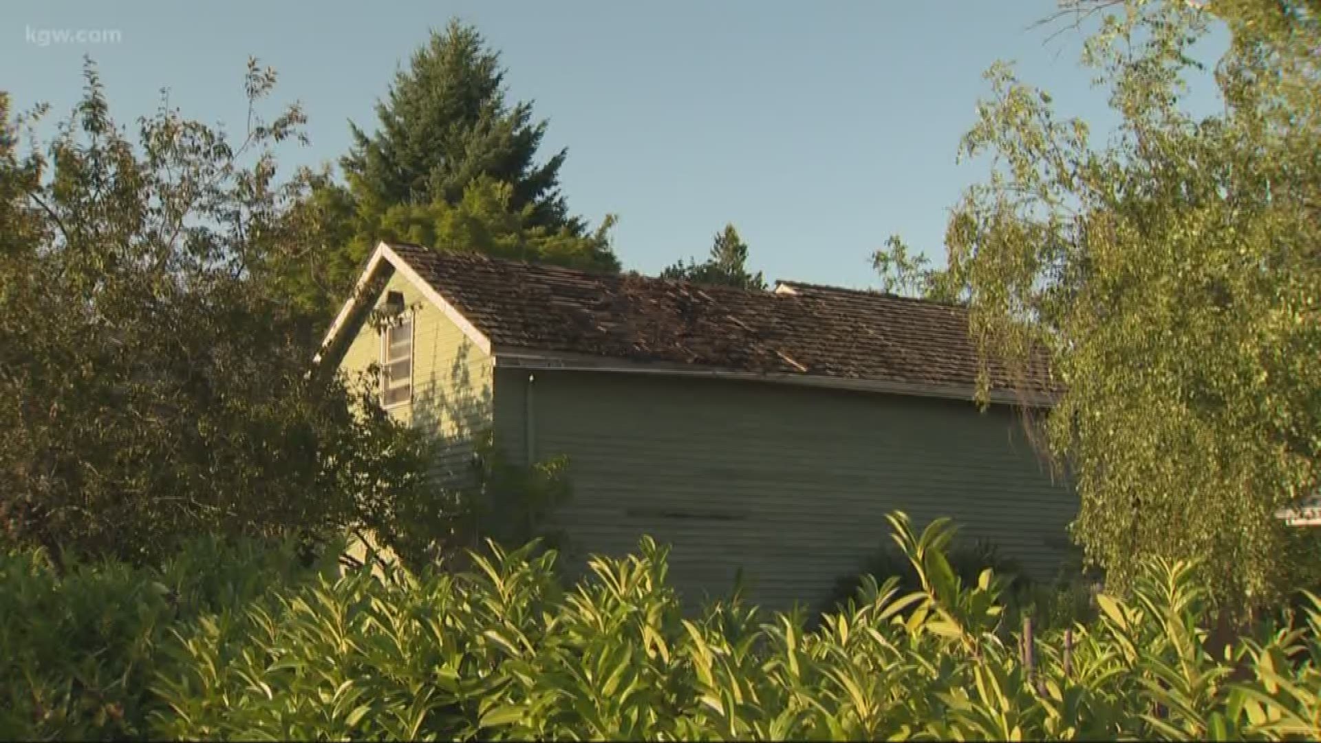 Homeless camp fire ignites house roof across the street