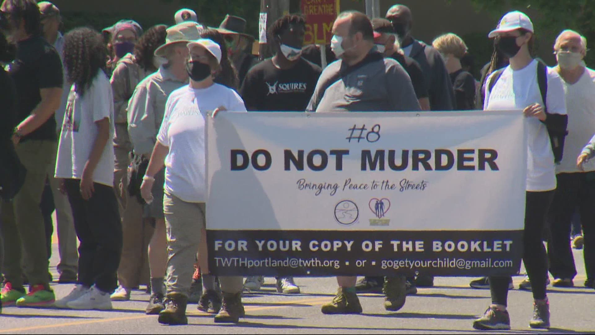 The march brought dozens of people to Peninsula Park on May 22, with a goal of sending a message that the Black community is against premeditated killing.
