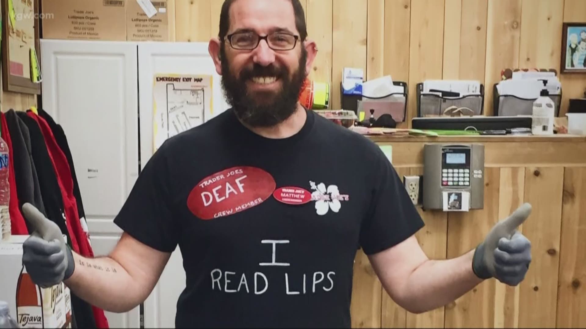 Matthew Simmons reads customers' lips if they don't know sign language. Protective masks created an unexpected communication barrier between them.