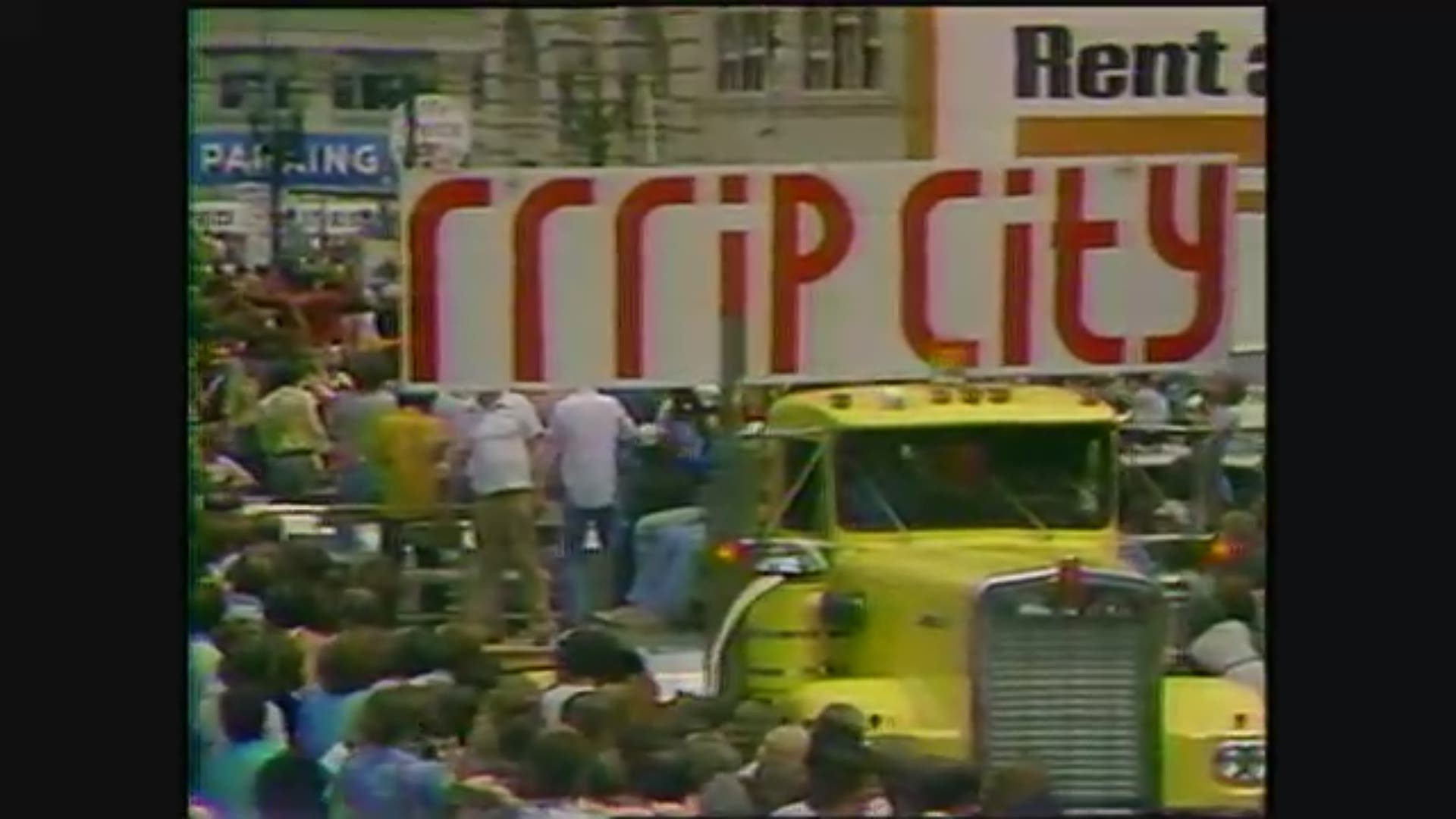 Portland celebrates the Trail Blazers' 1977 NBA Championship with a 'Blazer Day' victory parade downtown. And Bill Walton dumps Miller High Life on the trophy.