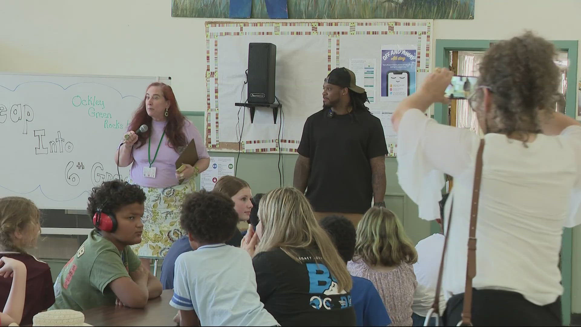 Green, a former local high school football star, dropped by as part of a Portland Public Schools four-week program, which offers one-on-one tutoring.  