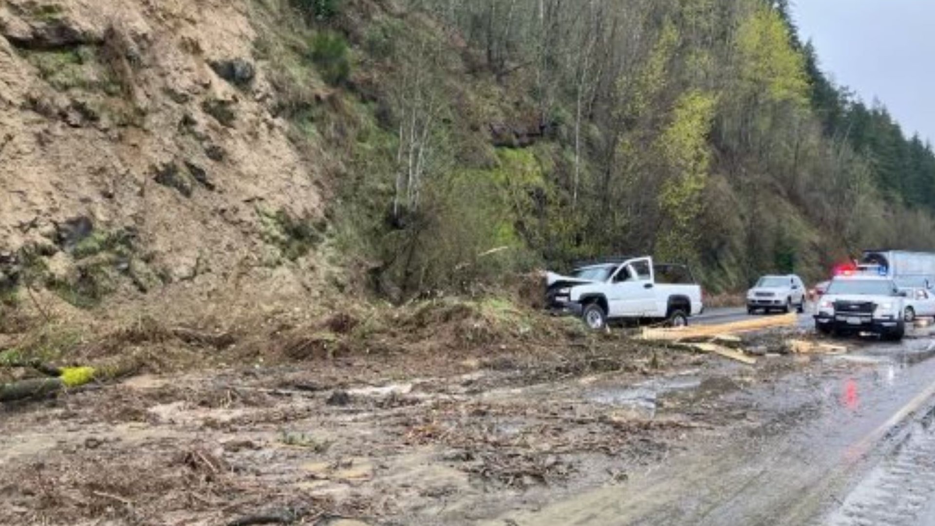 A landslide blocked all the Northbound lanes in the Woodland area. Debris struck two cars as a section of the hillside along I-5 came down.