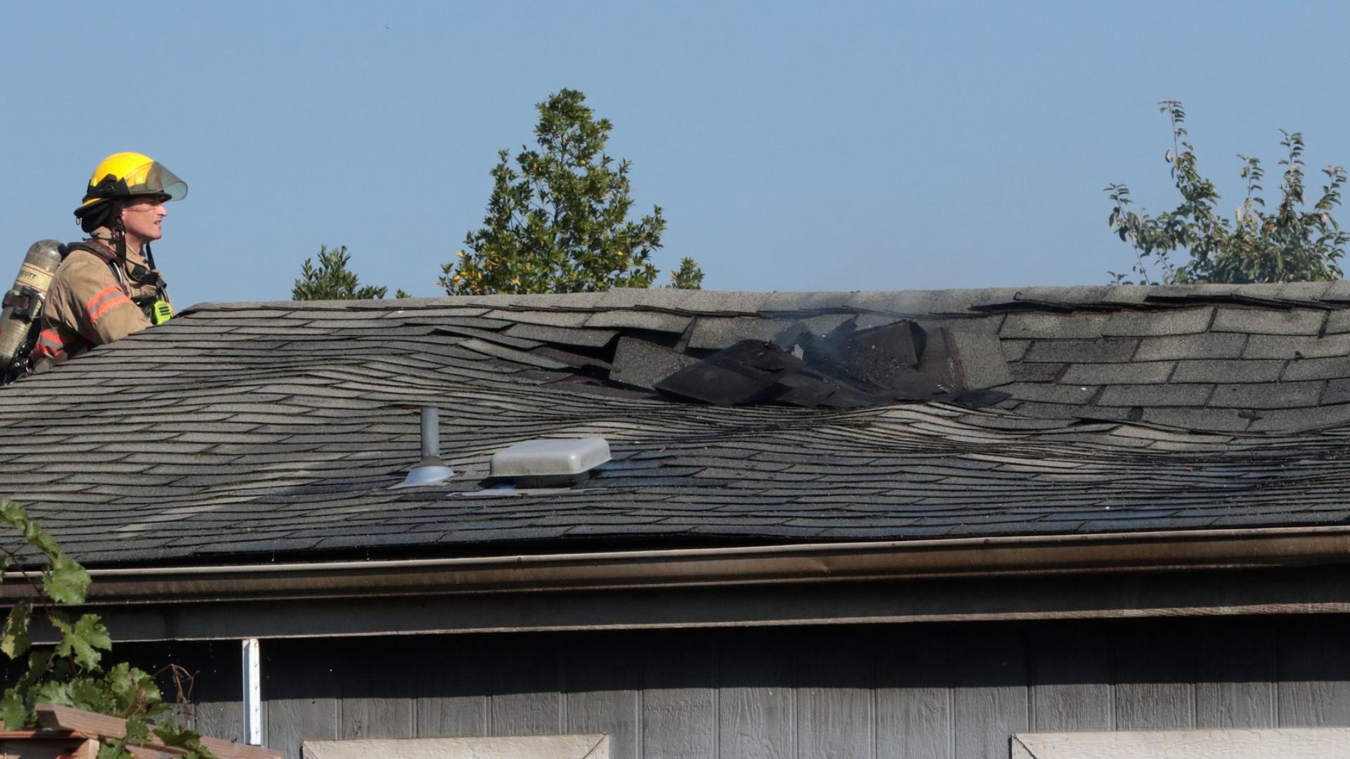 Crews extinguish house fire that spread to second home in Southeast ...