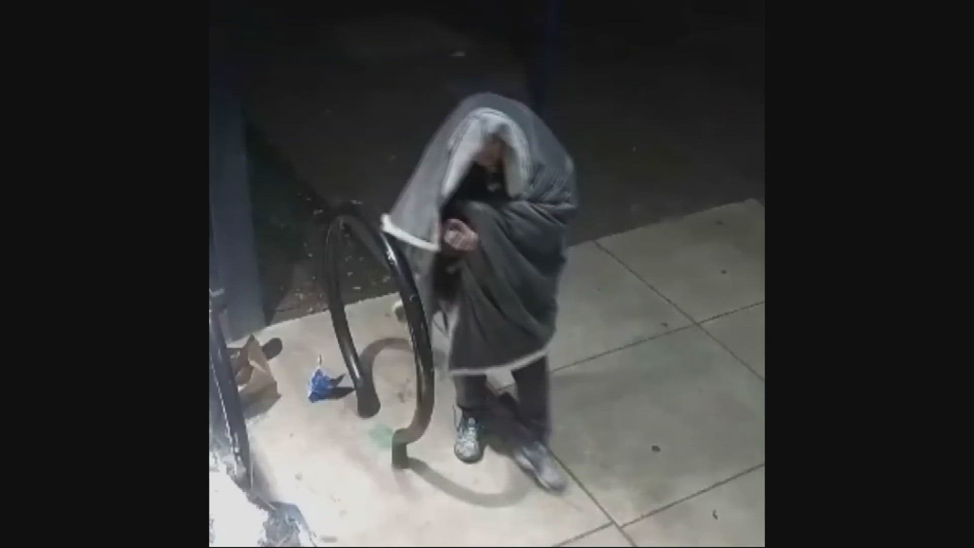 Investigators release videos of person of interest after fire at ...