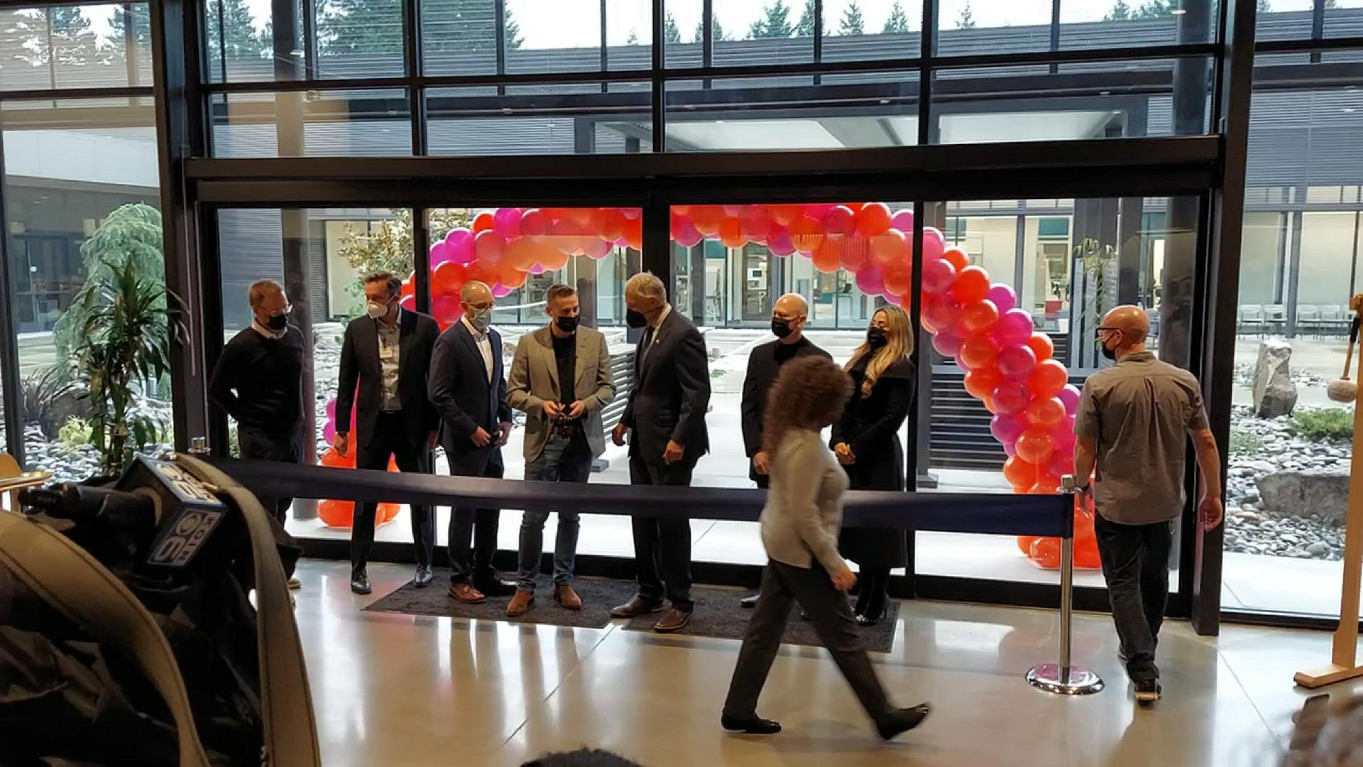 Gov. Jay Inslee participated in a ribbon-cutting ceremony at the new headquarters of biotechnology company Absci, which moved to East Vancouver earlier this year