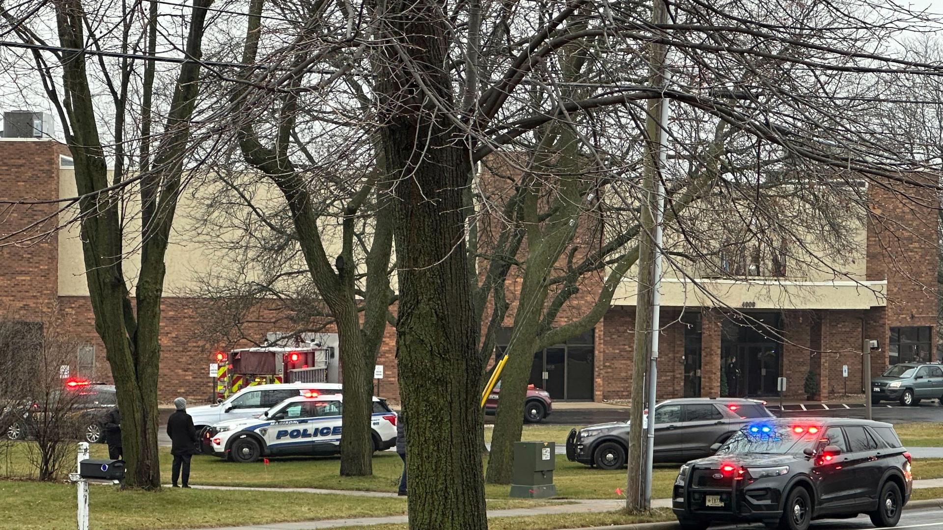 A youth opened fire at a private Christian school on Monday in Wisconsin, killing two people. The shooter also died, police said.