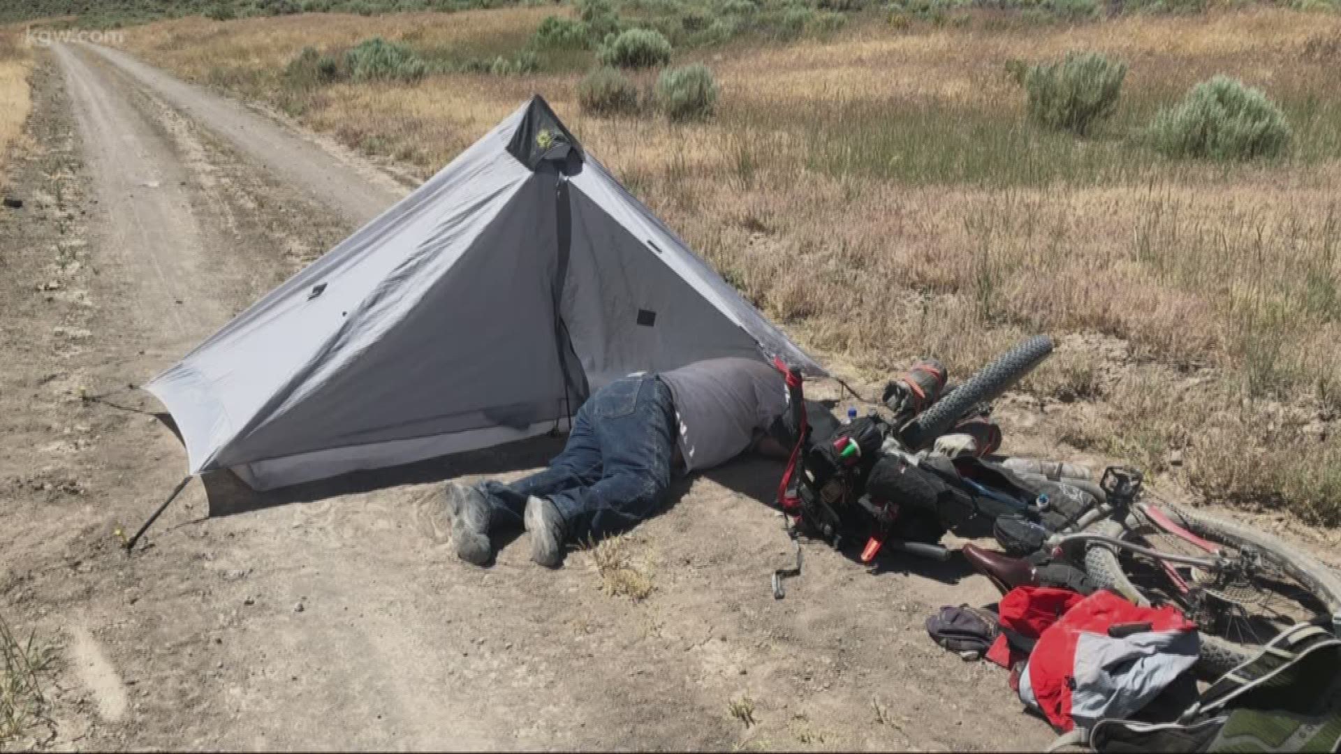 A 73-year-old man who was stranded in the remote Oregon high desert for four days with his two dogs was rescued when a long-distance mountain biker discovered him near death on a dirt road.