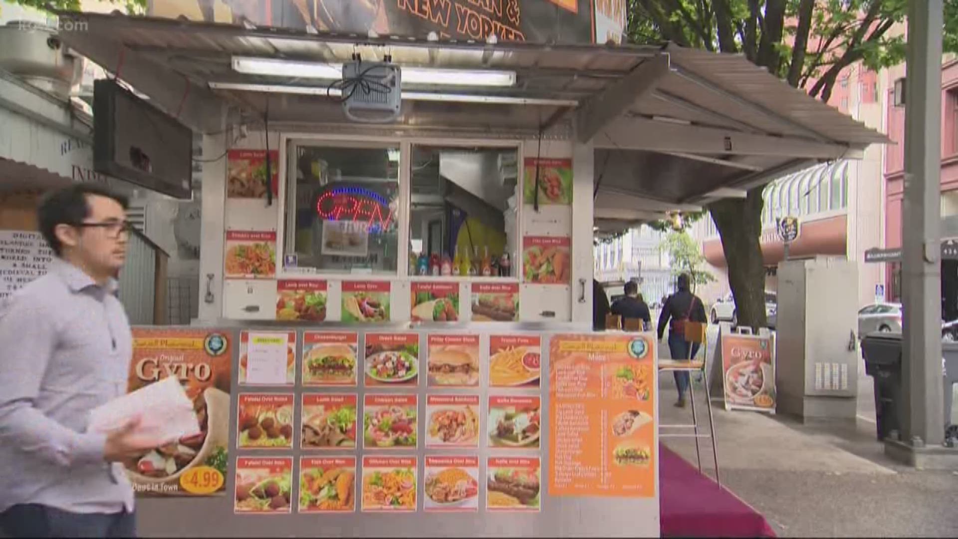 A woman seen on video being attacked by a Portland food cart owner says she forgives him.