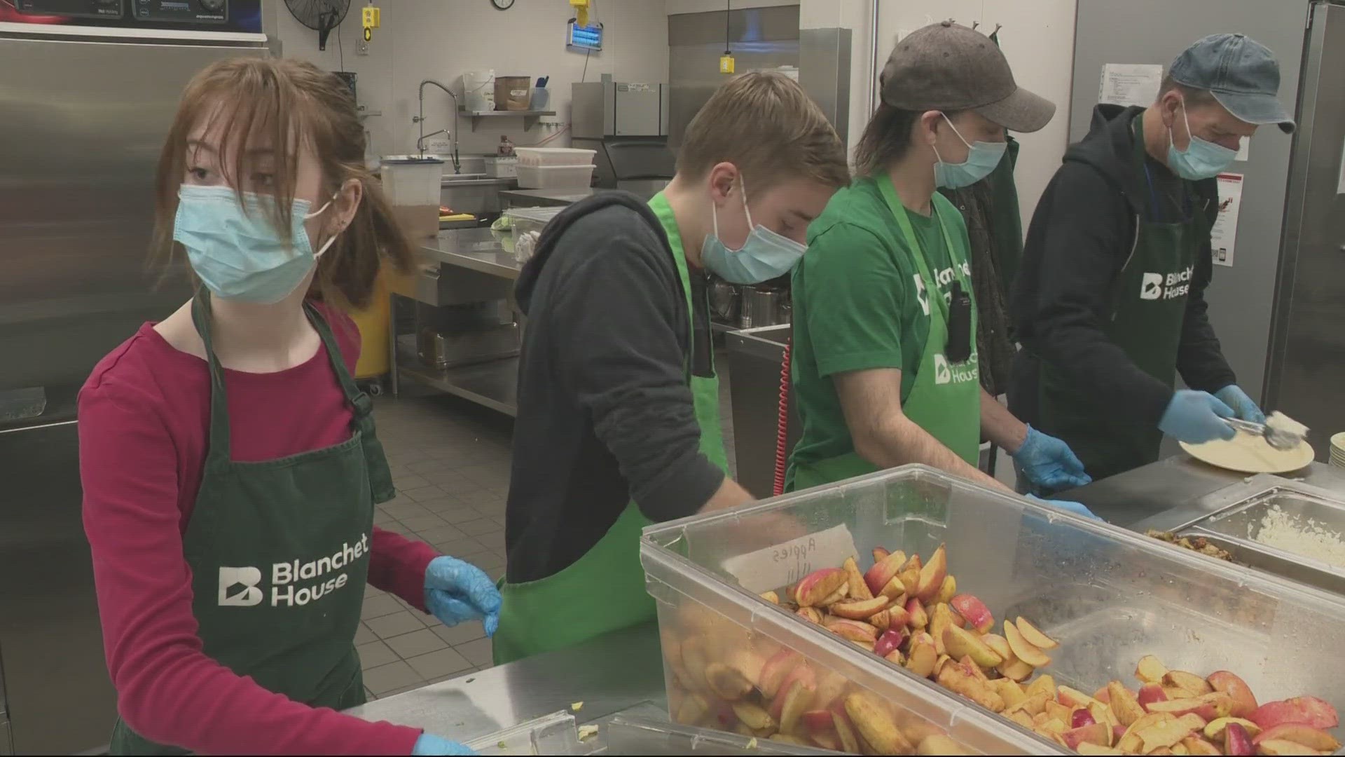 These Grant High students are volunteering at the Blanchet House’s kitchen.