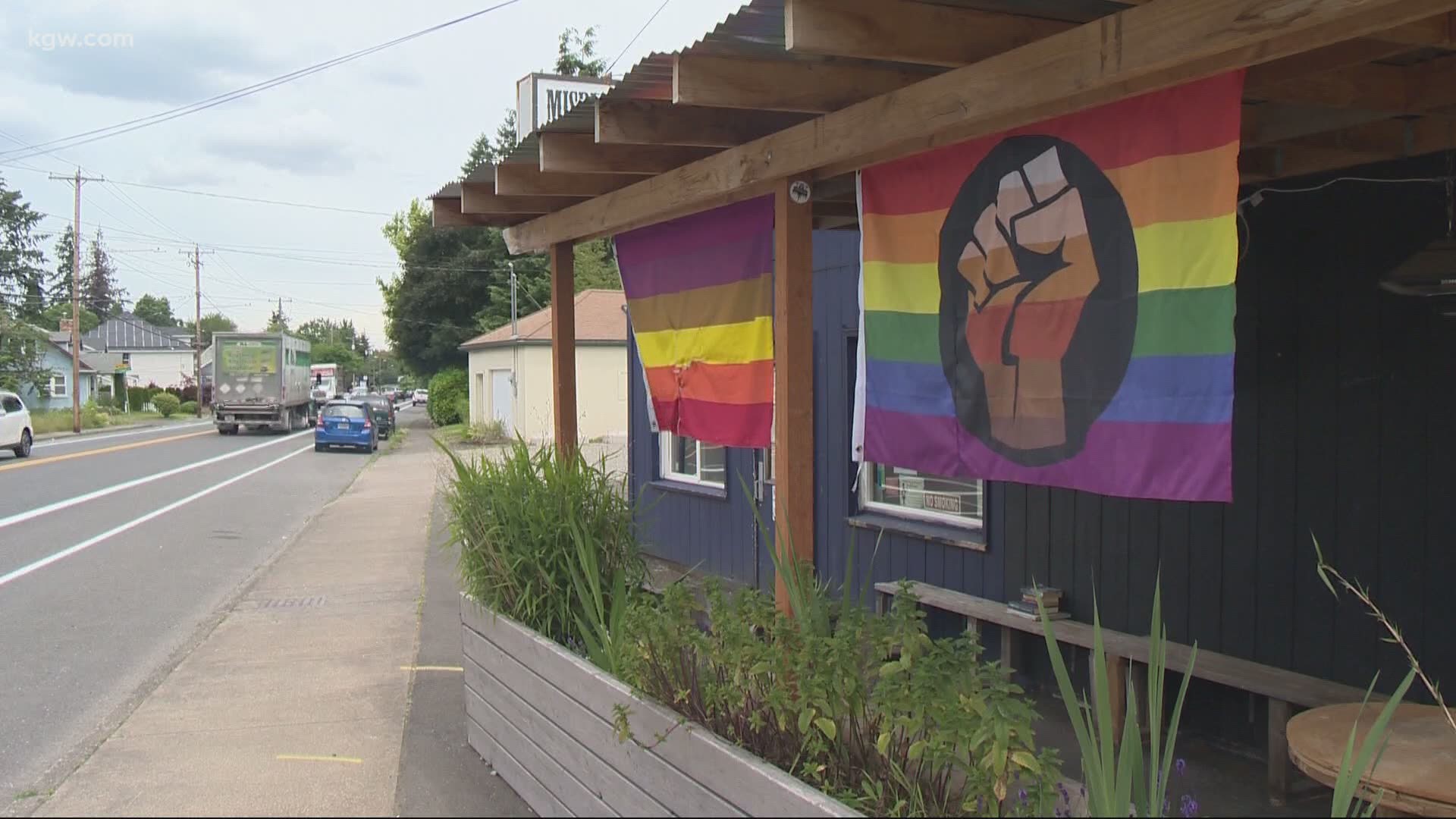 Someone vandalized a pride flag outside a Portland bar, but a neighbor helped make things right.