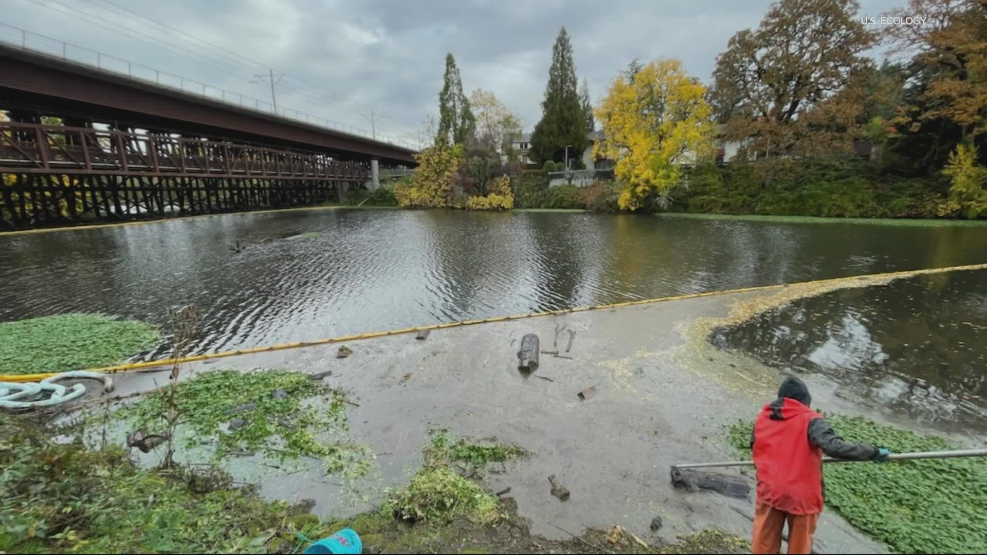 An Oct. 12 fire at a car dealership sent oil flowing toward Kellogg Creek. Officials are working to keep the oil from reaching the Willamette River.