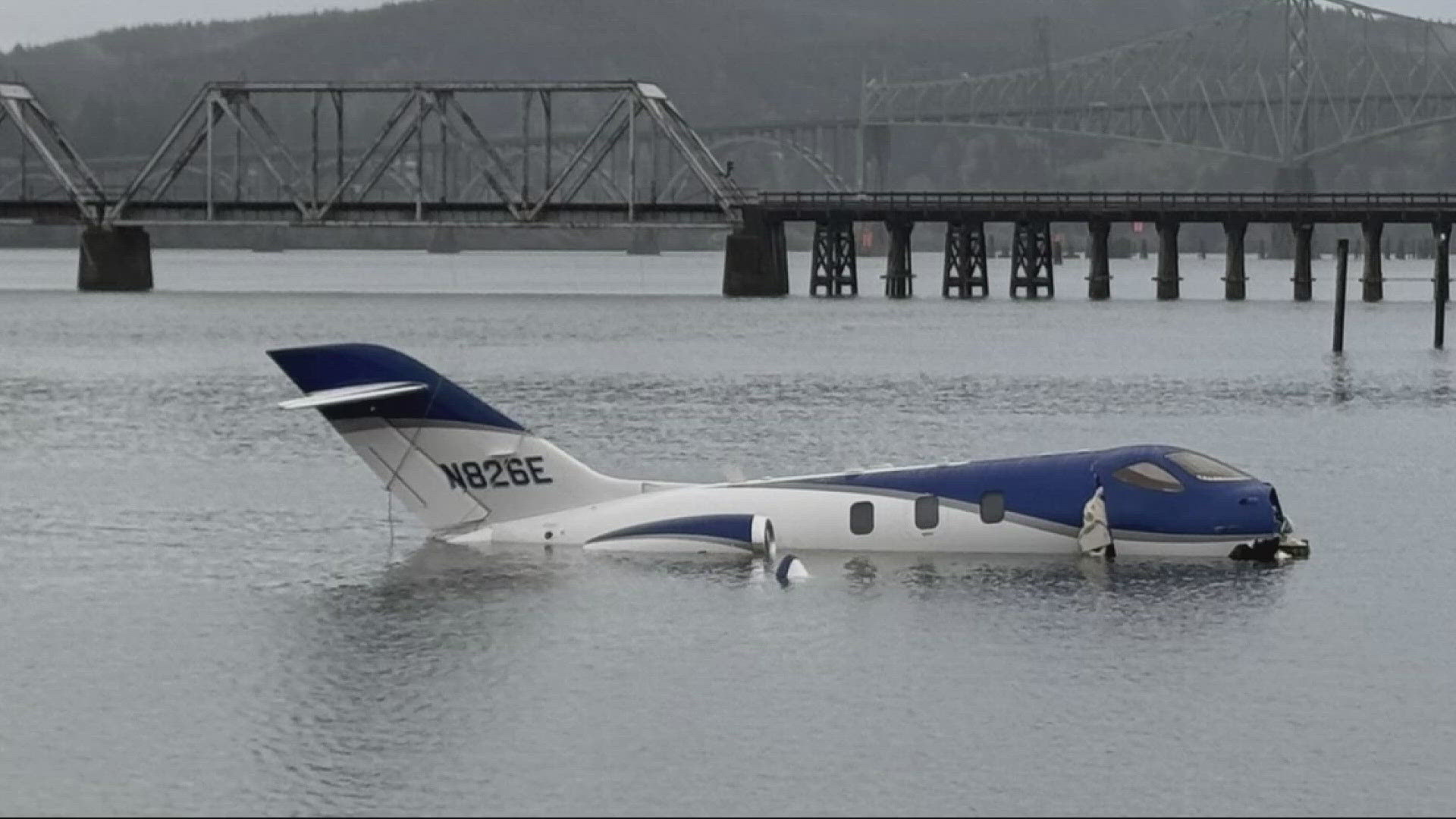 Small plane skids off runway into water in North Bend; 5 people