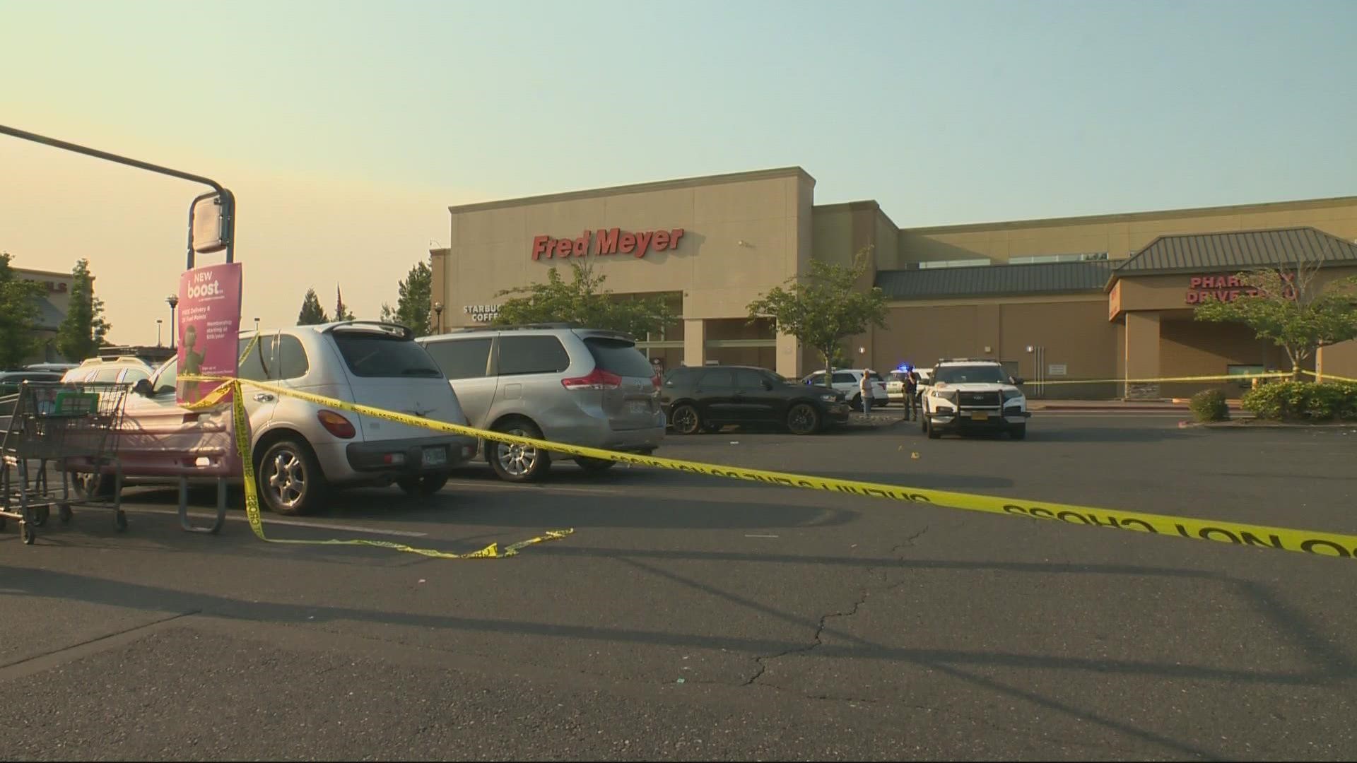 Officials believe two people were shooting at each other outside the store. Bullets hit the front of the store and multiple cars, but no people were injured.