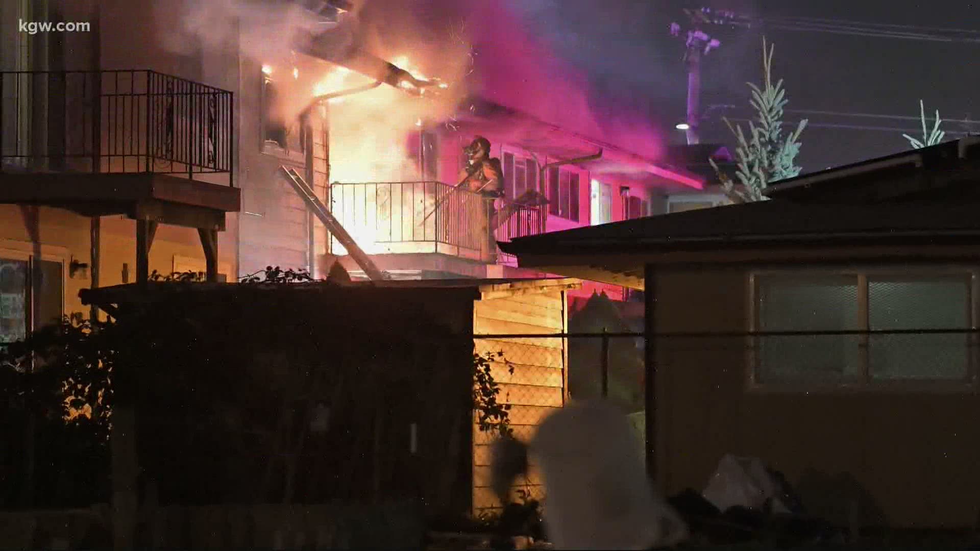 A family jumped to safety after a fire broke out at a Southeast Portland apartment building.