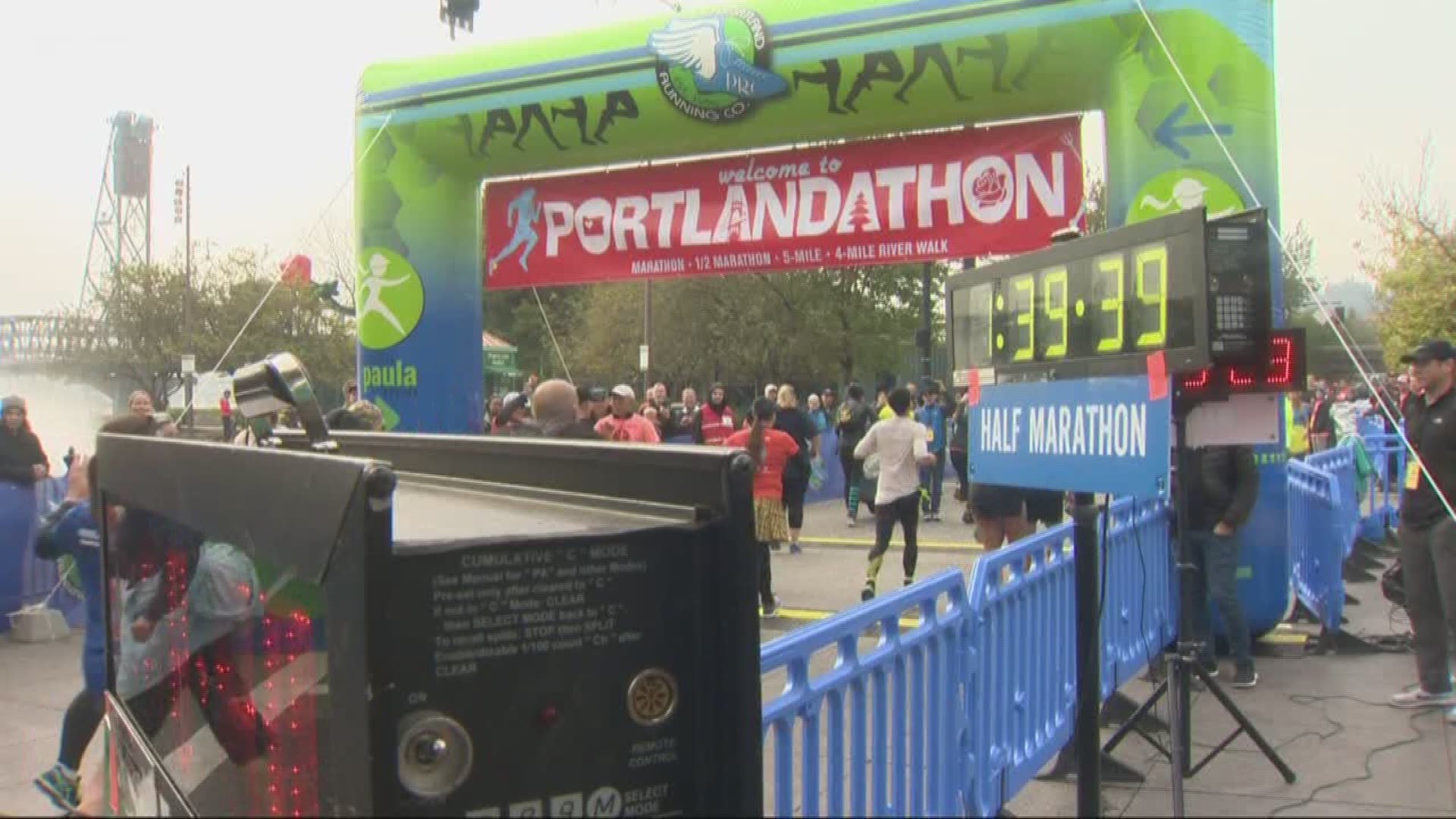 On a rainy race day for Portlandathon, a passing train caused delays for some runners. But the runners were still positive about the race.