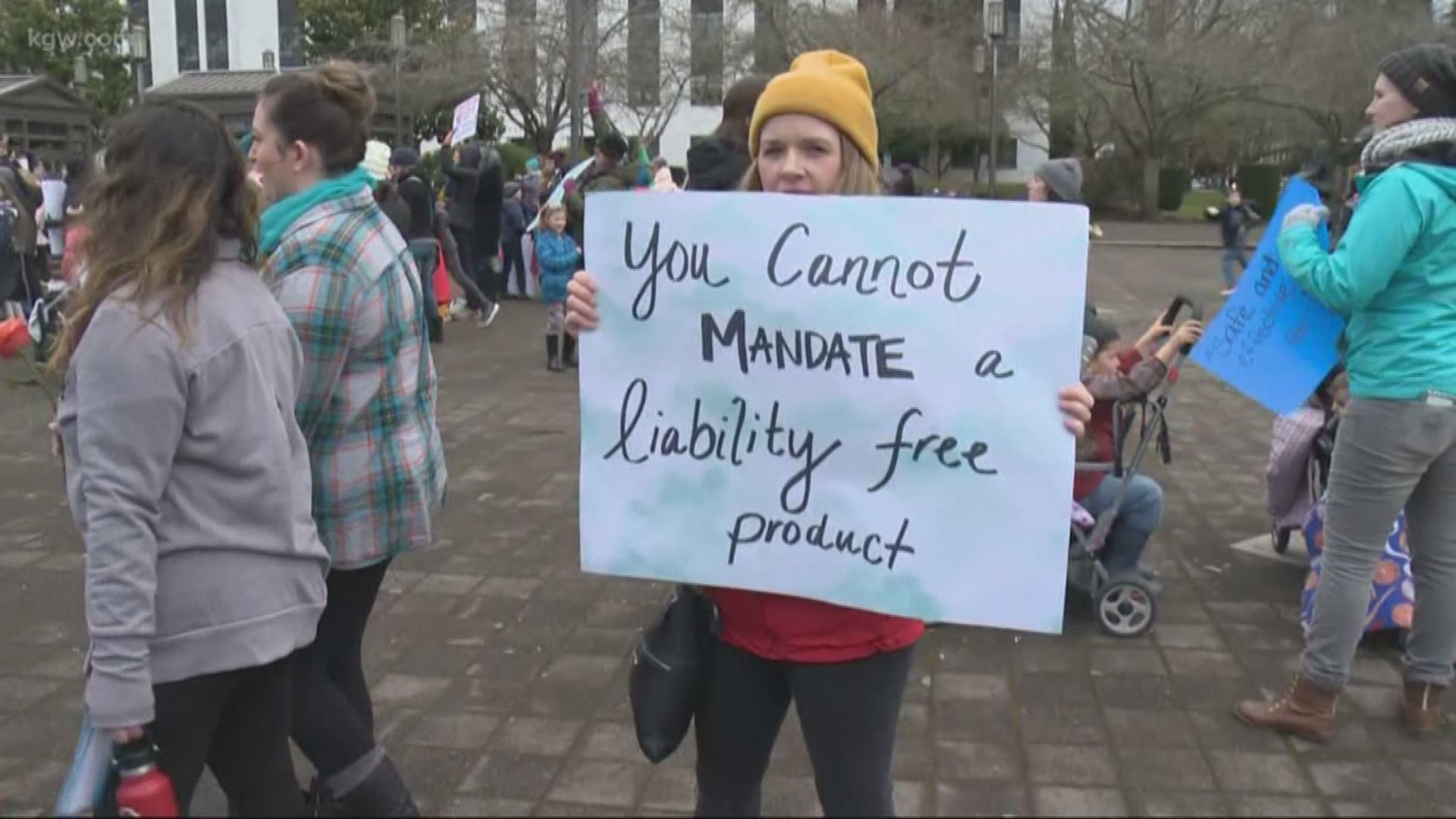 Opponents of a vaccine exemption bill rallied in Salem at the Capitol