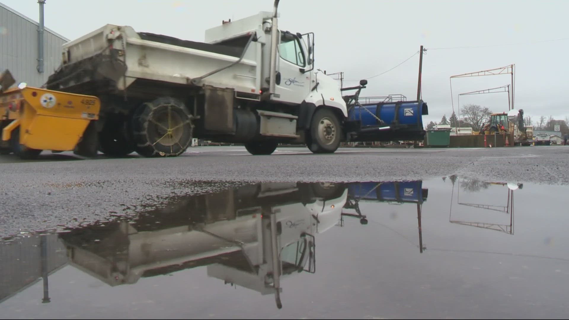 The city's public works department spent Friday attaching plows and loading trucks with supplies to treat the roads