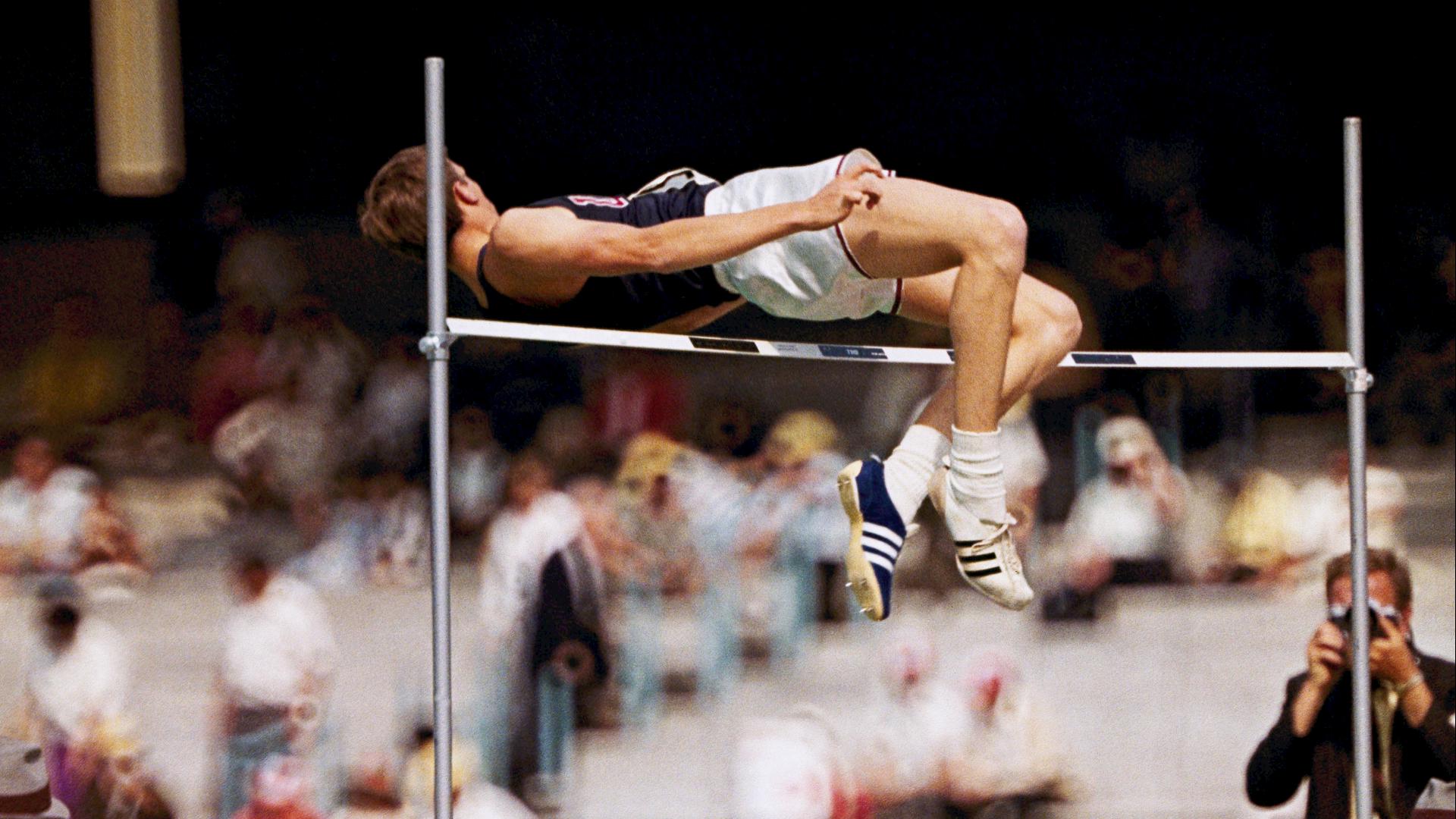 During the Paris Olympics, you'll see athletes launch themselves over the high jump bar using the same technique: the Fosbury Flop. Here's how the move got its name.