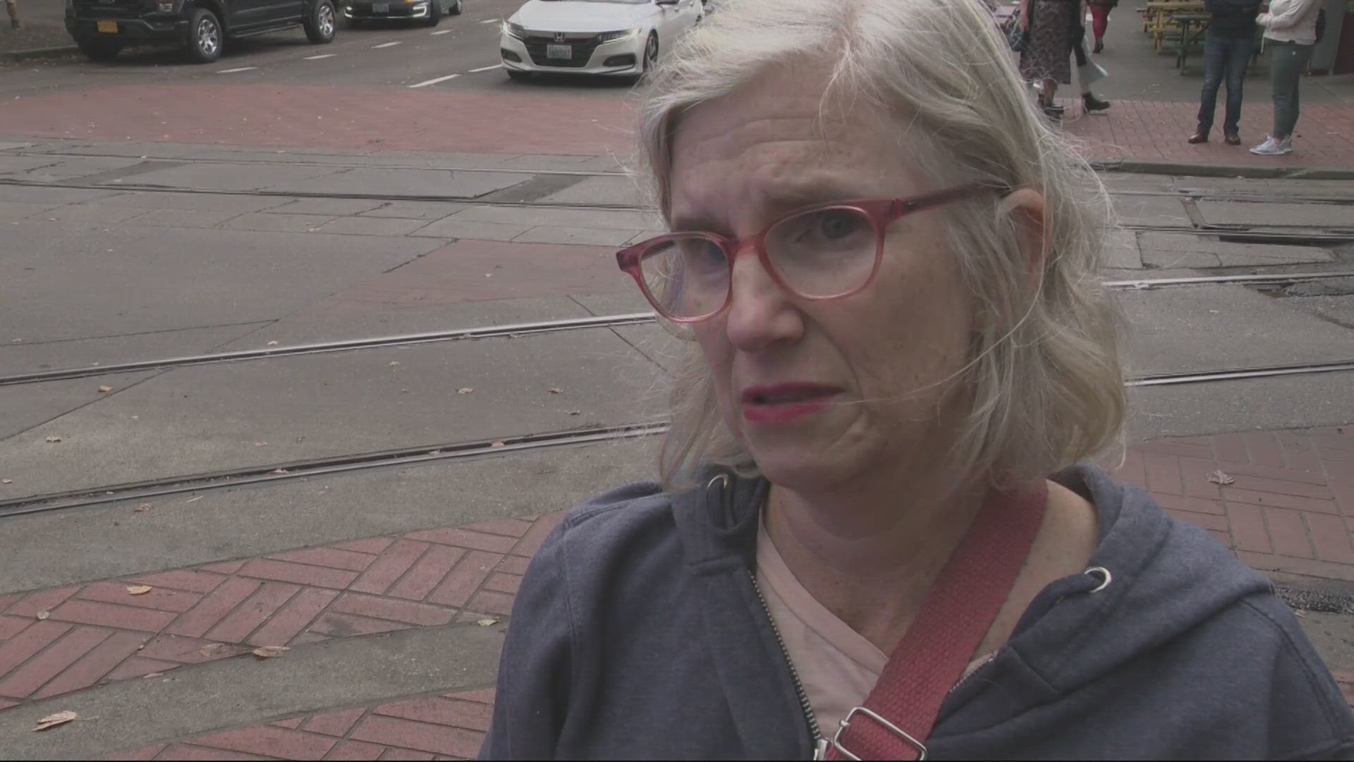 The witness told KGW said that she saw a driver shoot a man who'd approached him on foot, then shoot a bystander before driving away. Police have someone detained.