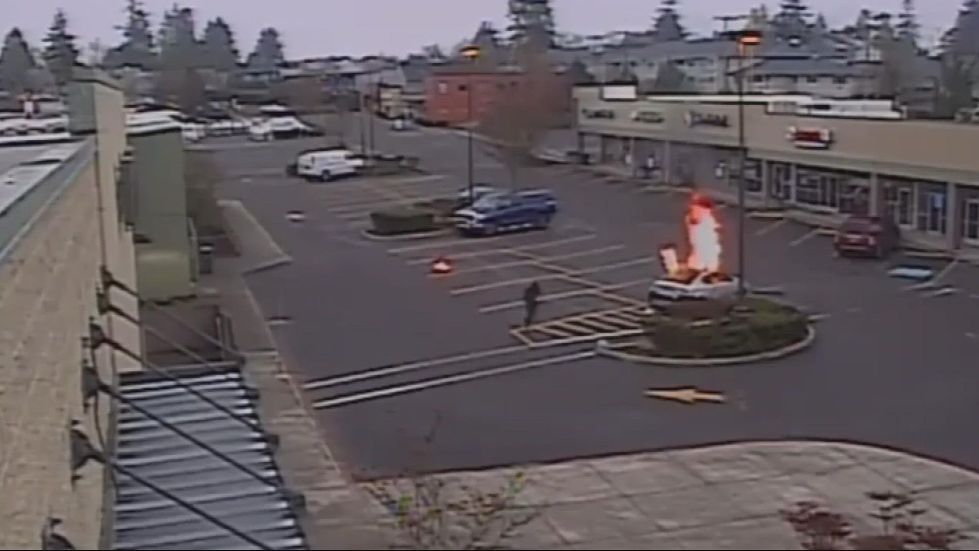 Authorities were called to a Fred Meyer in Beaverton for a car on fire. Surveillance shows someone seemingly setting the car on fire.